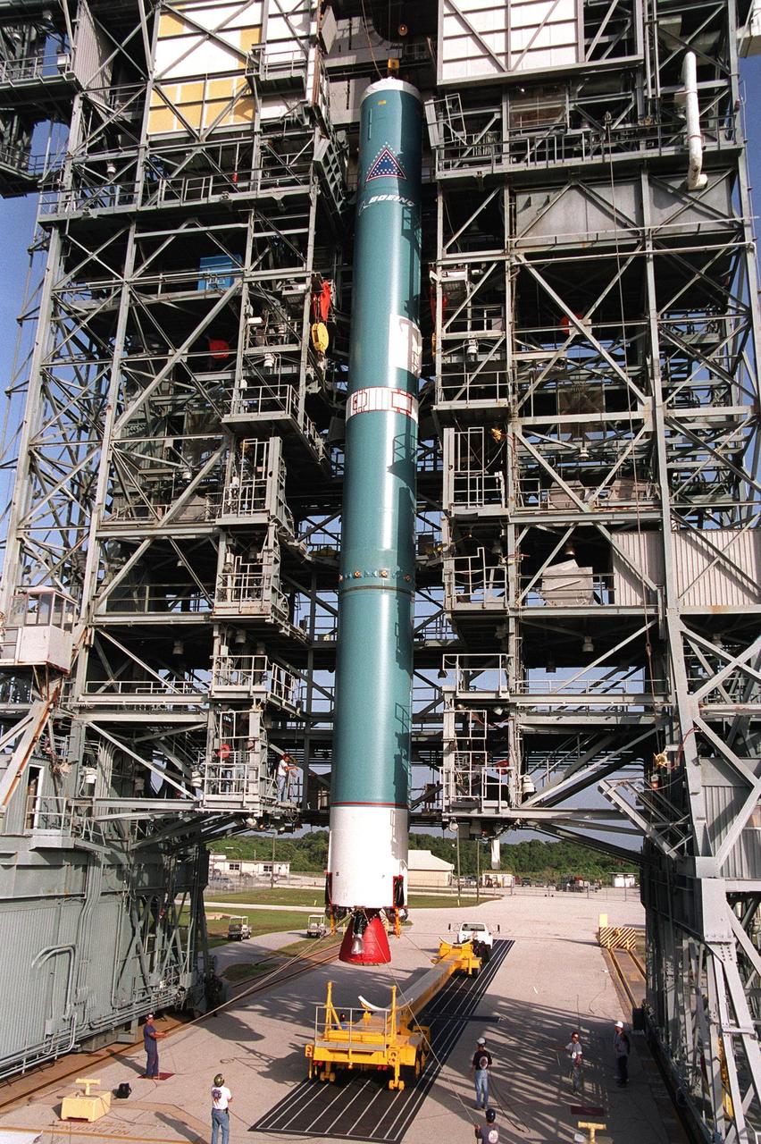 KENNEDY SPACE CENTER, Fla. -- On Launch Complex 17A, Cape Canaveral Air Force Station, a Boeing Delta II rocket is lifted off the transporter and into the gantry. The rocket will propel the Genesis spacecraft on a journey to capture samples of the ions and elements in the solar wind and return them to Earth for scientists to use to determine the exact composition of the Sun and the solar system's origin. NASA’s Genesis project in managed by the Jet Propulsion Laboratory in Pasadena, Calif. Lockheed Martin Astronautics built the Genesis spacecraft for NASA in Denver, Colo. The launch is scheduled for July 30 at 12:36 p.m. EDT