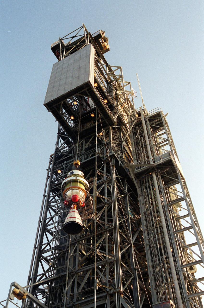 KENNEDY SPACE CENTER, Fla. -- The second stage of a Delta II rocket rises up the gantry on Launch Complex 17-A, Cape Canaveral Air Force Station, where it will be mated with the first stage. The Delta II will propel the Genesis spacecraft on a journey to capture samples of the ions and elements in the solar wind and return them to Earth for scientists to use to determine the exact composition of the Sun and the solar system’s origin. NASA’s Genesis project in managed by the Jet Propulsion Laboratory in Pasadena, Calif. Lockheed Martin Astronautics built the Genesis spacecraft for NASA in Denver, Colo. The launch is scheduled for July 30 at 12:36 p.m. EDT