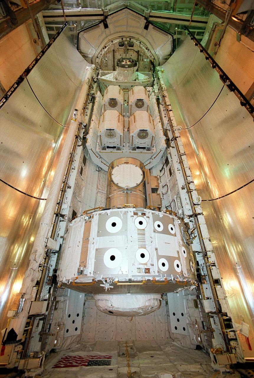 KENNEDY SPACE CENTER, Fla. -- Resting inside Atlantis’s payload bay are the Joint Airlock Module (bottom) and pallet containing the high pressure gas assembly (above). Both are heading for the International Space Station on mission STS-104, scheduled to be launched July 12. The module, which comprises a crew lock and an equipment lock, will be connected to the starboard (right) side of Node 1 Unity. Once installed and activated, the Airlock becomes the primary path for Space Station spacewalk entry and departure for U.S. spacesuits, which are known as Extravehicular Mobility Units, or EMUs. In addition, the Joint Airlock is designed to support the Russian Orlan spacesuit for EVA activity. The high pressure gas assembly will support future spacewalk operations from the Space Station and augment the Service Module gas resupply system