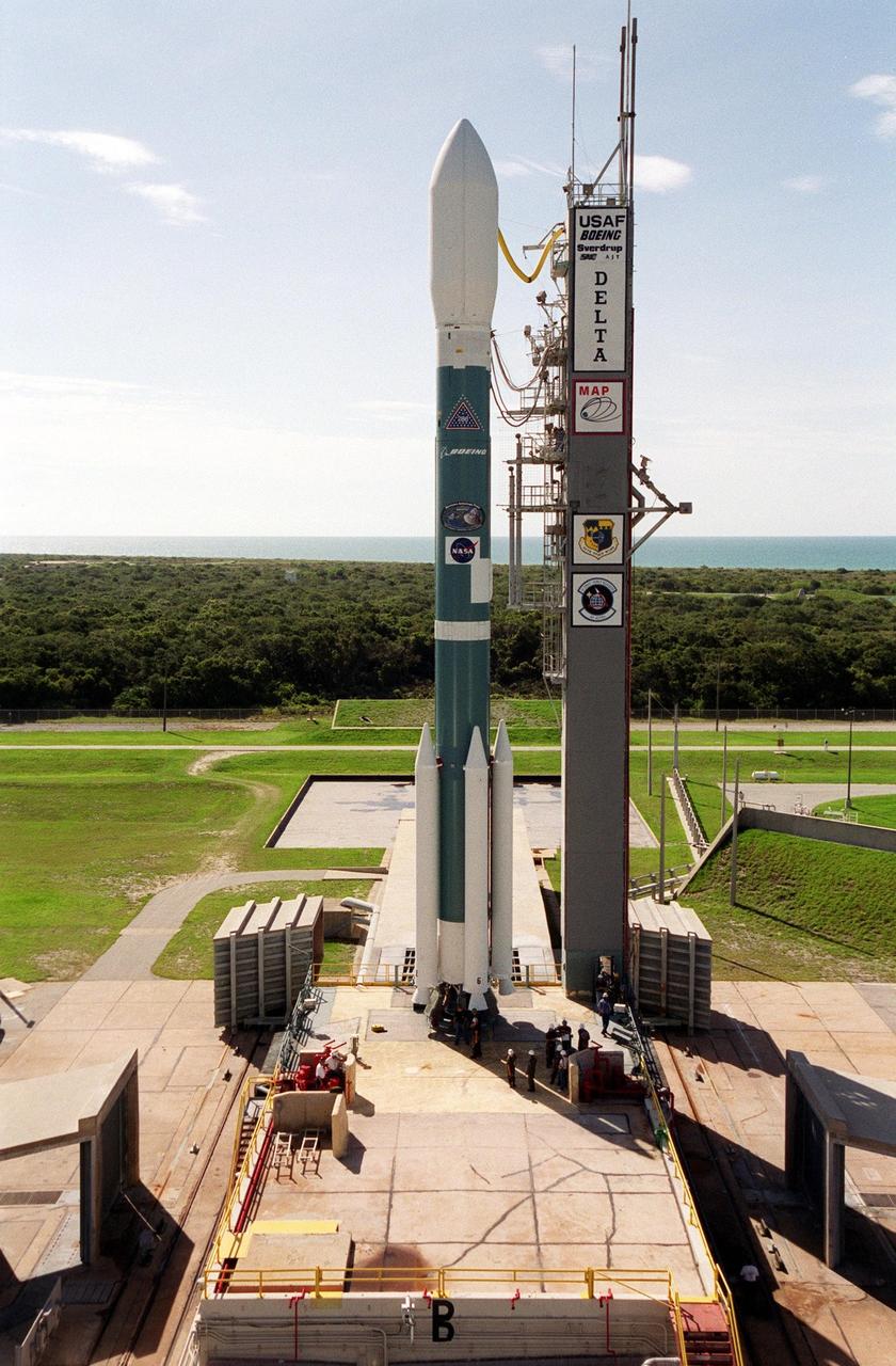 KENNEDY SPACE CENTER, Fla. -- The morning sky is nearly clear over Launch Complex 17-A, Cape Canaveral Air Force Station, and the waiting Boeing/Delta II rocket. The Atlantic Ocean can be seen on the horizon. Topping the rocket is the payload, the Microwave Anisotropy Probe (MAP) spacecraft. Launch is scheduled at 3:46 p.m. EDT June 30. The launch will place MAP into a lunar-assisted trajectory to the Sun-Earth for a 27-month mission. The probe will measure small fluctuations in the temperature of the cosmic microwave background radiation to an accuracy of one millionth of a degree. These measurements should reveal the size, matter content, age, geometry and fate of the universe. They will also reveal the primordial structure that grew to form galaxies and will test ideas about the origins of these primordial structures. The MAP instrument will be continuously shaded from the Sun, Earth, and Moon by the spacecraft. The probe is a product of Goddard Space Flight Center in partnership with Princeton University