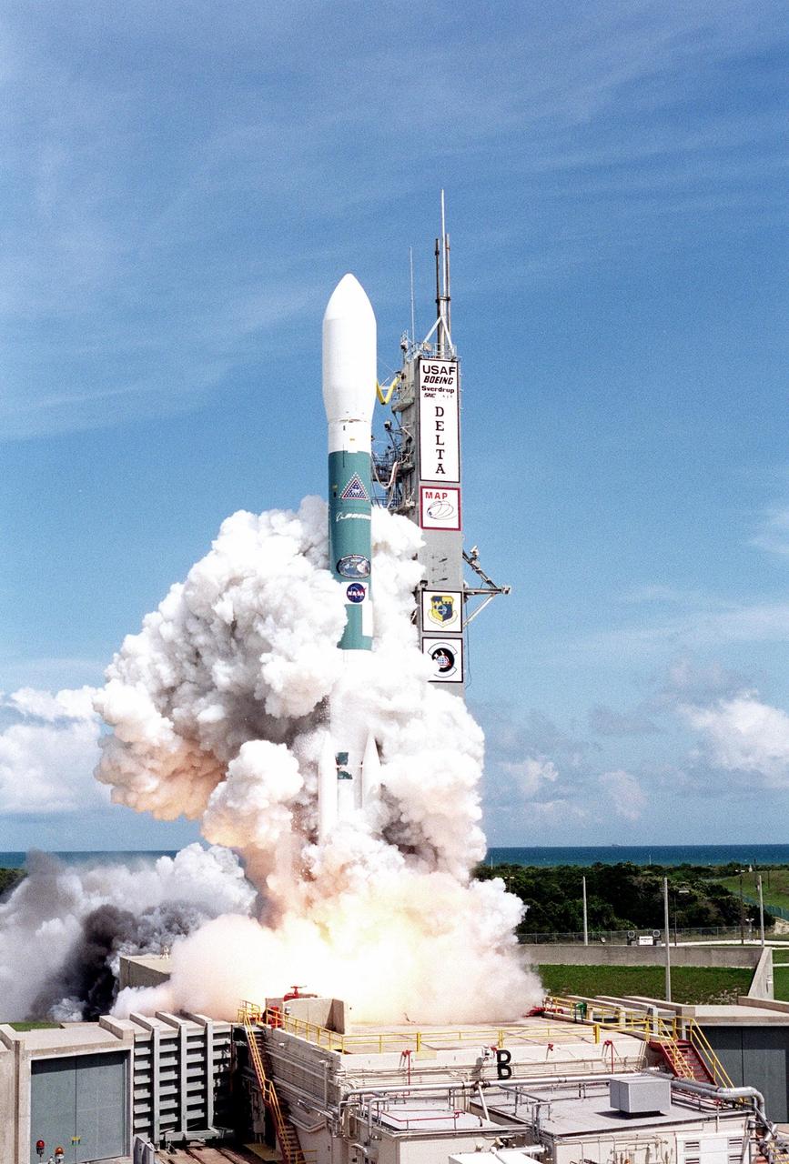 KENNEDY SPACE CENTER, Fla. -- Wrapped in billows of smoke and steam, the Boeing Delta II rocket lifts off Launch Complex 17-A, Cape Canaveral Air Force Station, carrying the Microwave Anisotropy Probe (MAP) spacecraft. The successful launch occurred at 3:46:46 p.m. EDT. The launch will place MAP into a lunar-assisted trajectory to the Sun-Earth for a 27-month mission. The probe will measure small fluctuations in the temperature of the cosmic microwave background radiation to an accuracy of one millionth of a degree. These measurements should reveal the size, matter content, age, geometry and fate of the universe. They will also reveal the primordial structure that grew to form galaxies and will test ideas about the origins of these primordial structures. The MAP instrument will be continuously shaded from the Sun, Earth, and Moon by the spacecraft. The probe is a product of Goddard Space Flight Center in partnership with Princeton University