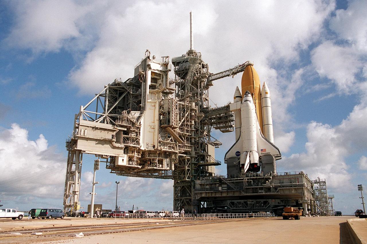KENNEDY SPACE CENTER, Fla. -- After an early morning rollout from the Vehicle Assembly Building, Space Shuttle Discovery sits atop a mobile launcher platform on Launch Pad 39A. Discovery is scheduled to launch in early August on mission STS-105