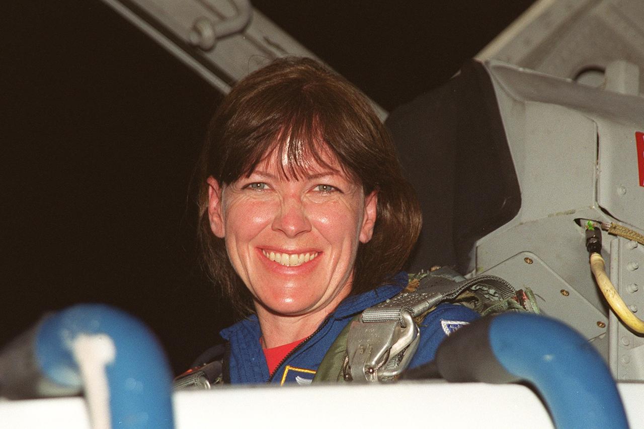 KENNEDY SPACE CENTER, Fla. -- STS-104 Mission Specialist Janet Lynn Kavandi arrives at the KSC Shuttle Landing Facility to make final preparations for launch of Space Shuttle Atlantis July 12. The mission is the 10th assembly flight to the International Space Station and carries the Joint Airlock Module, which will become the primary path for spacewalk entry and departure using both U.S. spacesuits and the Russian Orlan spacesuit for EVA activity