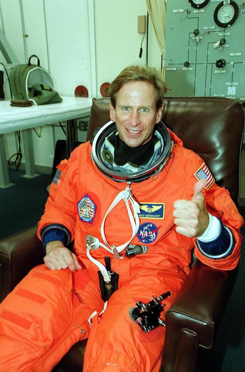 KENNEDY SPACE CENTER, Fla. -- STS-104 Mission Specialist Michael L. Gernhardt signals he is ready for launch. This will be his fourth space flight. Liftoff of Space Shuttle Atlantis on mission STS-104 is targeted for 5:04 a.m., July 12, from Launch Pad 39B. The primary payload on the mission is the joint airlock module, which will be added to the International Space Station. The airlock will be the primary path for Space Station spacewalk entry and departure for U.S. spacesuits, and will also support the Russian Orlan spacesuit for EVA activity