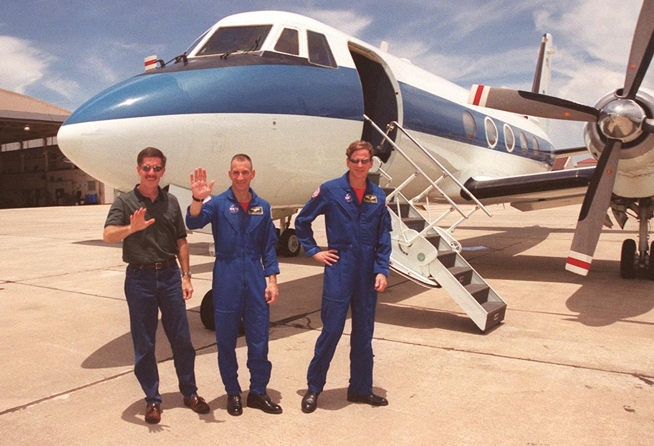 KENNEDY SPACE CENTER, Fla. -- Members of the STS-104 crew get ready to return to Houston after their successful mission to the International Space Station. Leaving from Patrick Air Force Base are (left to right) Mission Specialist James F. Reilly, Pilot Charles O. Hobaugh and Mission Specialist Michael L. Gernhardt. The crew completed their mission Tuesday, July 24, landing at KSC after 13 days in orbit