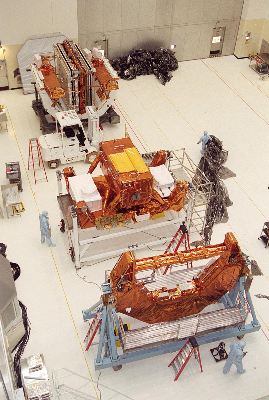 KENNEDY SPACE CENTER, Fla. --   In the Vertical Processing Facility, various components of the payload on mission STS-109 rest on workstands after being unwrapped. The purpose of the STS-109 mission is servicing the Hubble Space Telescope.  The primary servicing tasks of the mission are to replace Solar Array 2 with Solar Array 3, replace the Power Control Unit, remove the Faint Object Camera and install the Advanced Camera for Surveys, install the NICMOS Cooling System, and install New Outer Blanket Insulation on bays 5 through 8.  Mission STS-109 is scheduled for launch in mid-February 2002