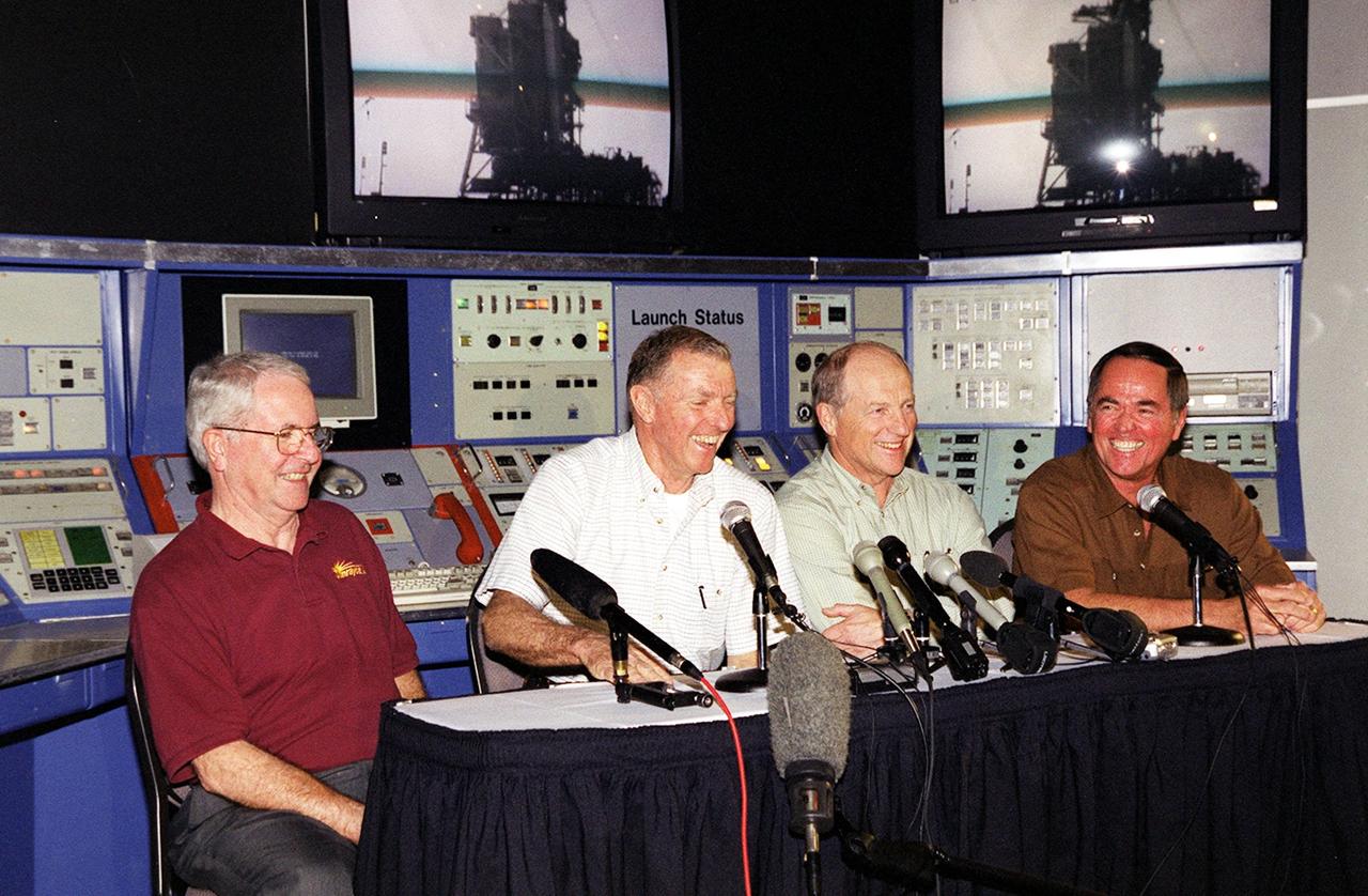 KENNEDY SPACE CENTER, Fla. -- The first four Shuttle astronauts -- seated, from left, Richard Truly, Joe Engle, Frederick "Rick" Hauck and Robert Crippen -- share a light moment about their experiences while seated in a replica of the early launch control center in the KSC Visitor Complex. All were inducted into the U.S. Astronaut Hall of Fame Nov. 10
