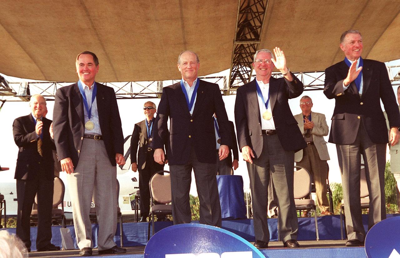 KENNEDY SPACE CENTER, Fla. -- Astronaut Hall of Fame inductees Robert Crippen, Frederick "Rick" Hauck, Richard Truly and Joe Engle acknowledge the applause from the audience. The four were honored as the first Shuttle astronauts in a ceremony at the KSC Visitor Complex Nov. 10.