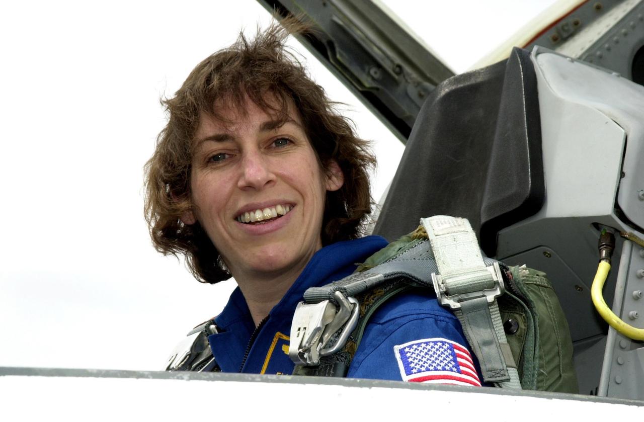 KENNEDY SPACE CENTER, FLA. - STS-110 Mission Specialist Ellen Ochoa arrives at the KSC Shuttle Landing Facility to prepare for launch April 4.  The mission will be her fourth Space Shuttle flight. Mission STS-110 is the 13th assembly flight to the International Space Station.  During four planned spacewalks, crew members will install the S0 Integrated Truss Structure (ITS), centerpiece of the orbiting International Space Station (ISS), at the center of the 10-truss, girderlike structure that will ultimately extend the length of a football field on the ISS.   The S0 truss will be attached to the U.S. Lab, "Destiny,"  on the 11-day mission.