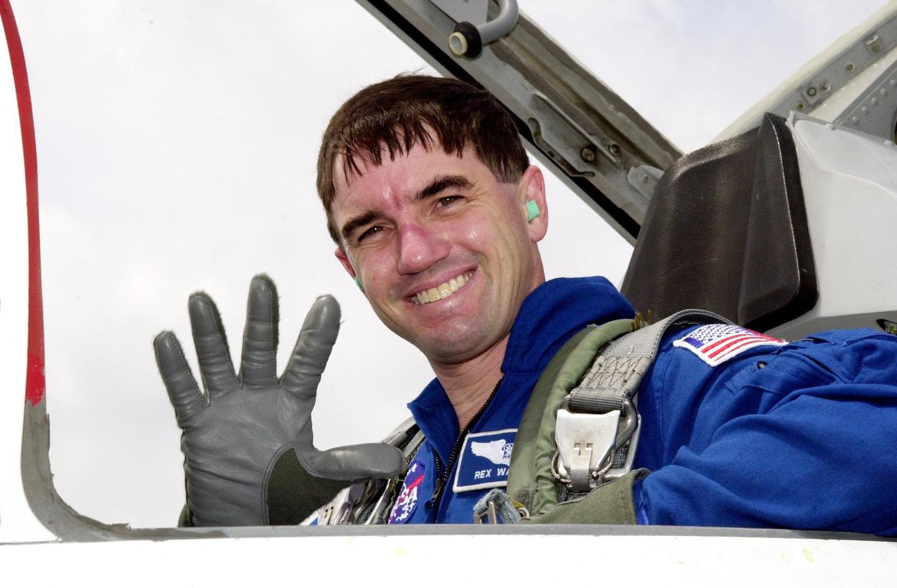 KENNEDY SPACE CENTER, FLA. - After landing at the KSC Shuttle Landing Facility, STS-110 Mission Specialist Rex Walheim smiles in anticipation of his first Space Shuttle flight, scheduled for launch April 4. Mission STS-110 is the 13th assembly flight to the International Space Station.  During four planned spacewalks, crew members will install the S0 Integrated Truss Structure (ITS), centerpiece of the orbiting International Space Station (ISS), at the center of the 10-truss, girderlike structure that will ultimately extend the length of a football field on the ISS.   The S0 truss will be attached to the U.S. Lab, "Destiny,"  on the 11-day mission