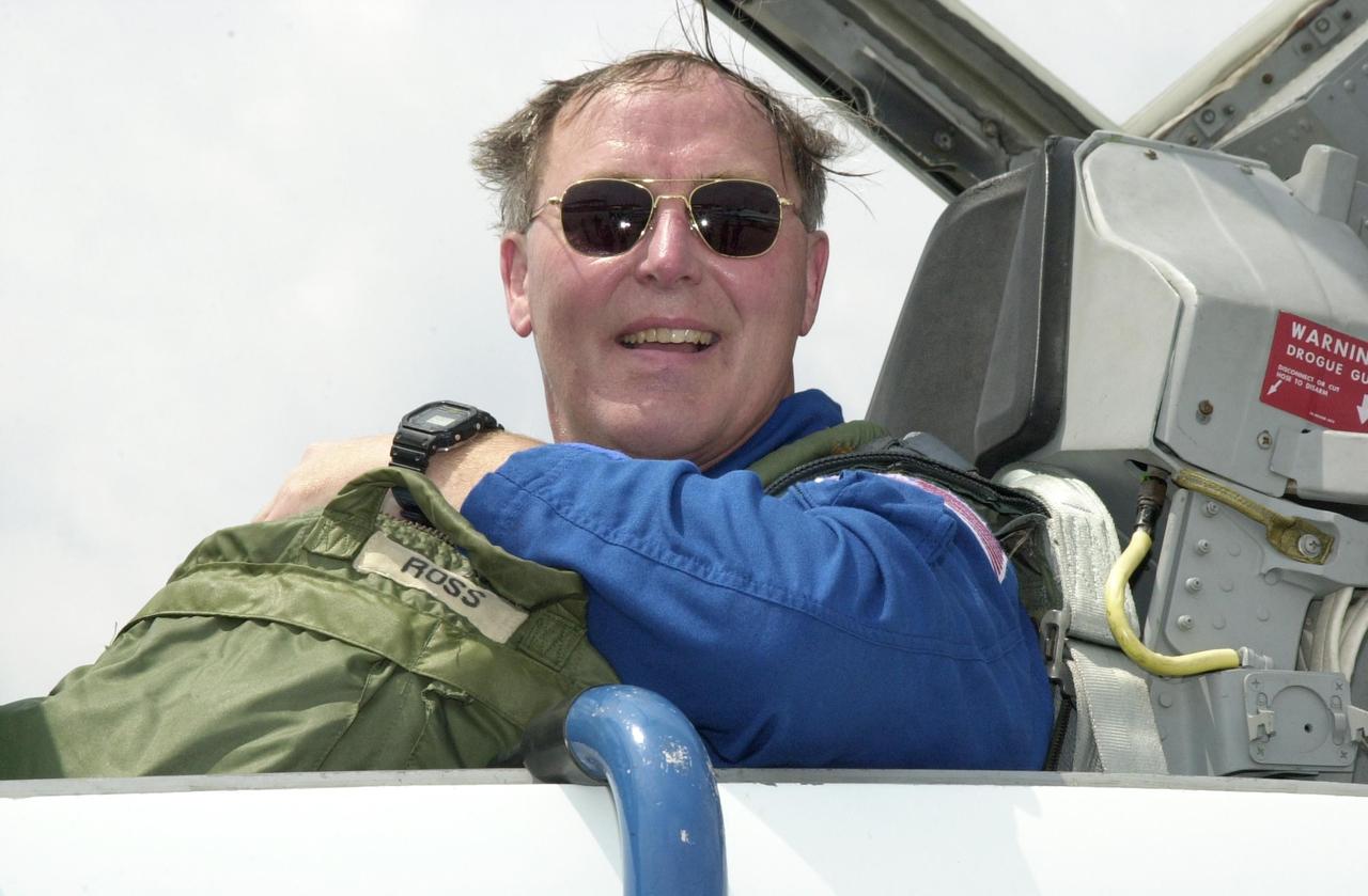 KENNEDY SPACE CENTER, FLA. --  After arriving at the KSC Shuttle Landing Facility, STS-110 Mission Specialist Jerry Ross smiles in anticipation of his record-breaking seventh Space Shuttle flight, scheduled to launch April 4. Mission STS-110 is the 13th assembly flight to the International Space Station.  During four planned spacewalks, Ross and other crew members will install the S0 Integrated Truss Structure (ITS), centerpiece of the orbiting International Space Station (ISS), at the center of the 10-truss, girderlike structure that will ultimately extend the length of a football field on the ISS.   The S0 truss will be attached to the U.S. Lab, "Destiny,"  on the 11-day mission
