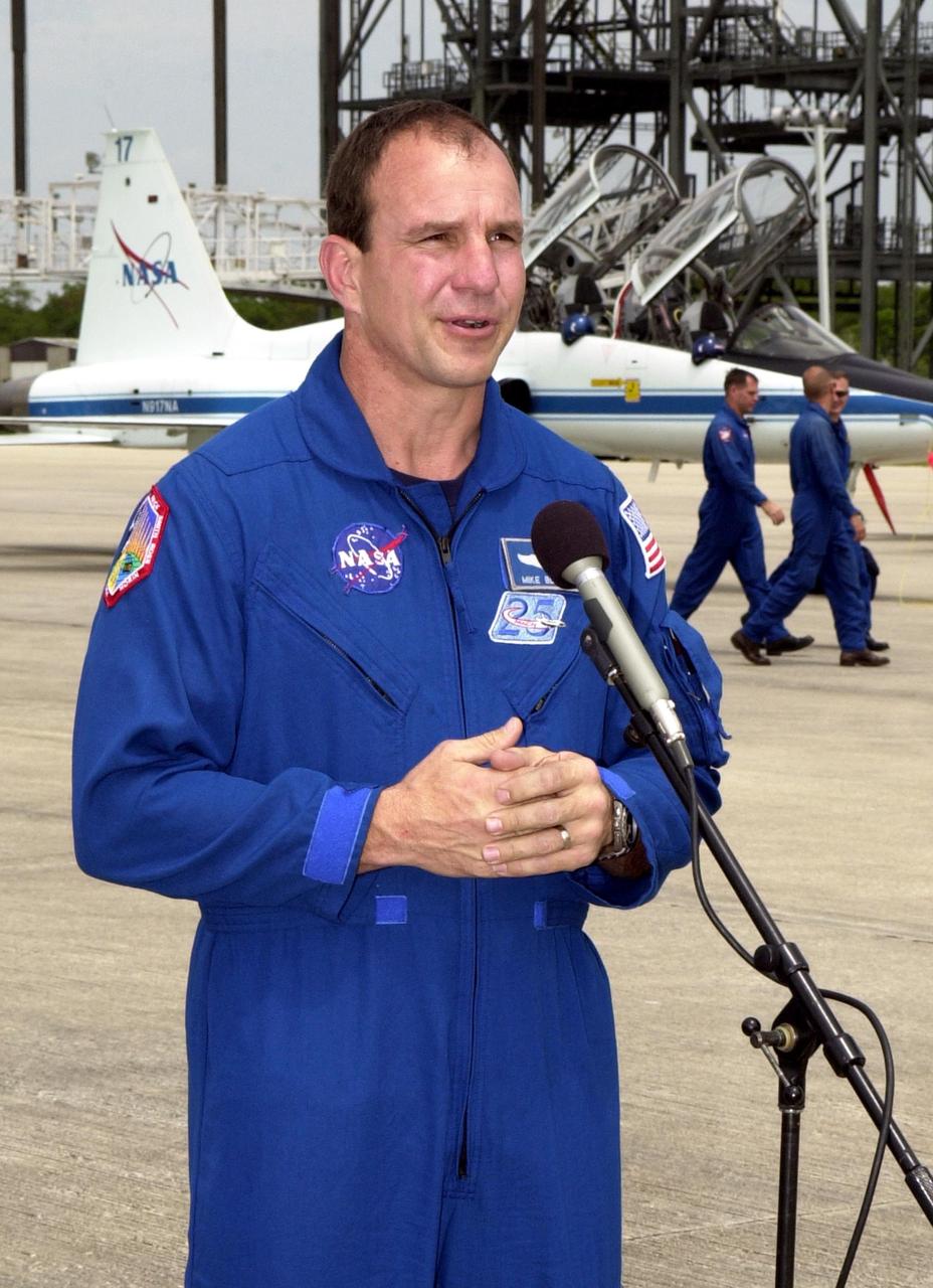 KENNEDY SPACE CENTER, FLA. --  --  After landing at the KSC Shuttle Landing Facility to prepare for launch April 4, STS-110 Commander Michael Bloomfield comments about the upcoming mission for the media. Mission STS-110 is the 13th assembly flight to the International Space Station.  During four planned spacewalks, crew members will install the S0 Integrated Truss Structure (ITS), centerpiece of the orbiting International Space Station (ISS), at the center of the 10-truss, girderlike structure that will ultimately extend the length of a football field on the ISS.   The S0 truss will be attached to the U.S. Lab, "Destiny,"  on the 11-day mission