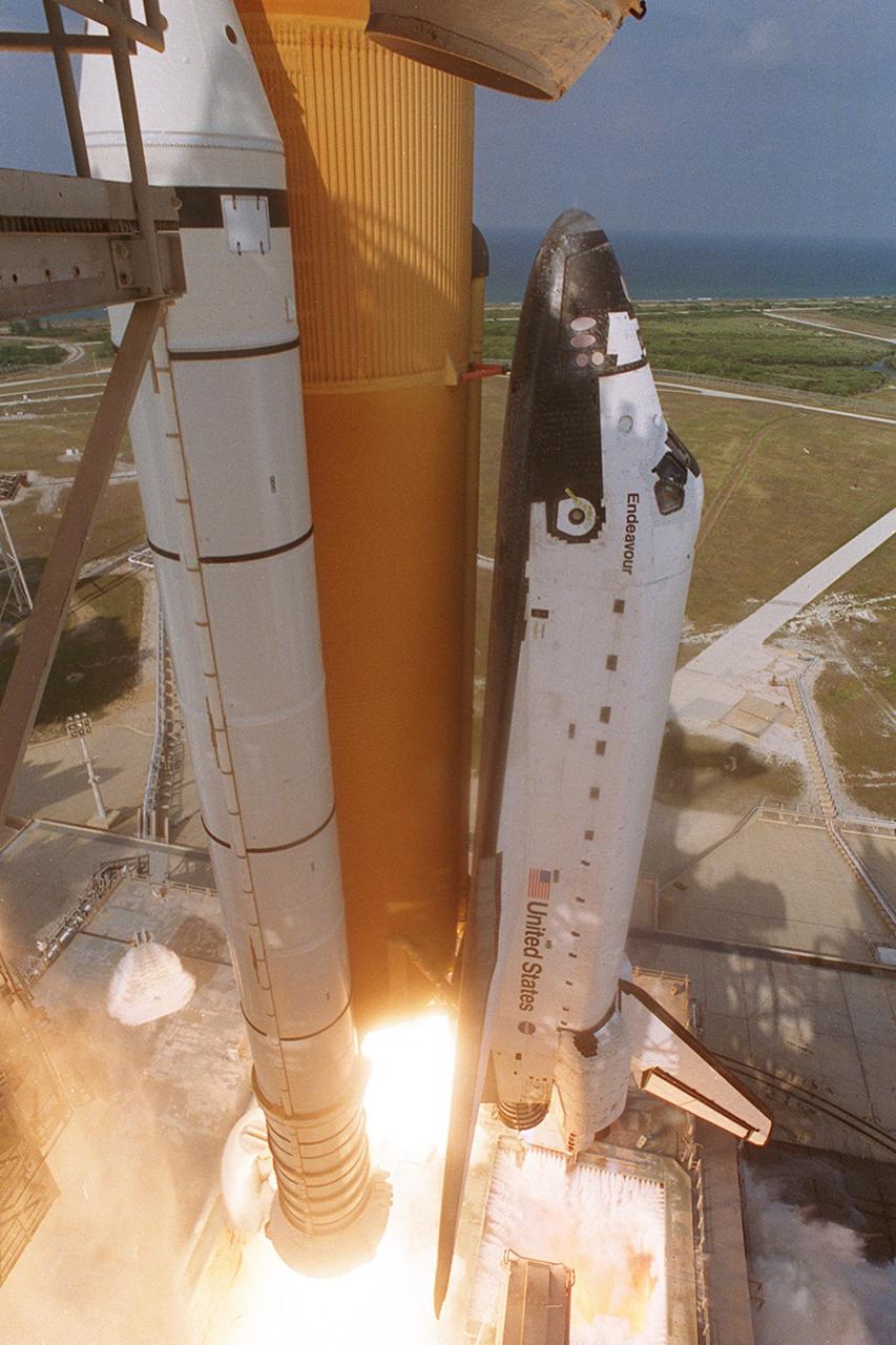 KENNEDY SPACE CENTER, FLA. --  A camera at the pad catches this closeup view of Space Shuttle Endeavour just after liftoff, which occurred at 5:22:49 p.m. EDT.  The Shuttle and crew are bound for the International Space Station on mission STS-111, a utilization flight. This mission marks the 14th Shuttle flight to the International Space Station and the third Shuttle mission this year. Mission STS-111 is the 18th flight of Endeavour and the 110th flight overall in NASA's Space Shuttle program