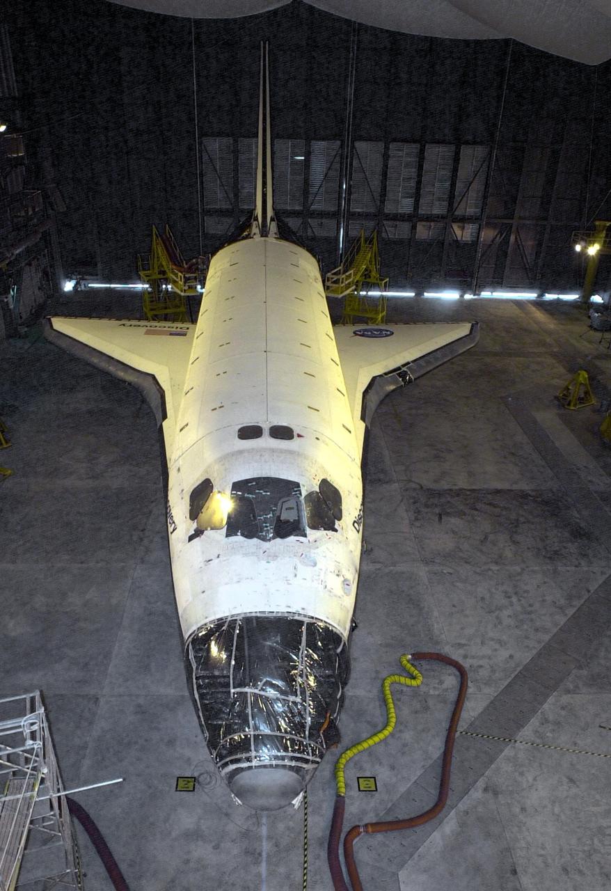 KENNEDY SPACE CENTER, FLA. --  The orbiter Discovery waits in the Vehicle Assembly Building until it can be transferred to the Orbiter Processing Facility.  Discovery last flew on mission STS-105 in August 2001