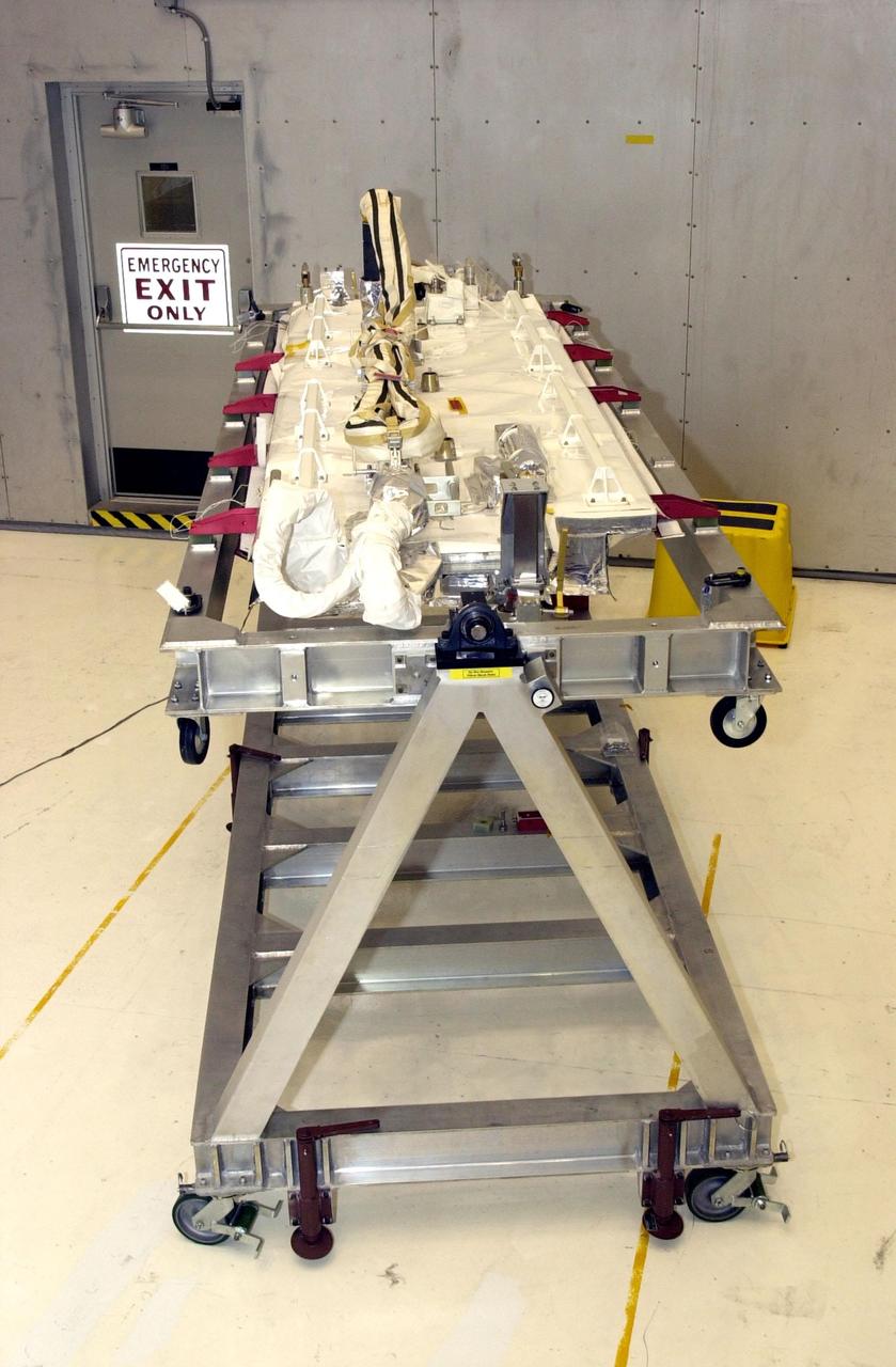 KENNEDY SPACE CENTER, FLA. -- The NICMOS II radiator is ready for checkout in the Vertical Processing Facility. The Near Infrared Camera and Multi-Object Spectrometer (NICMOS) Cooling System is part of the payload on mission STS-109, the Hubble Servicing Telescope mission. NICMOS is a new experimental cooling system consisting of a compressor and tiny turbines. With the experimental cryogenic system, NASA hopes to re-cool the infrared detectors to below -315 degrees F (-193 degrees Celsius). NICMOS II was previously tested aboard STS-95 in 1998. NICMOS could extend the life of the Hubble Space Telescope by several years. Astronauts aboard Columbia on mission STS-109 will be replacing the original NICMOS with the newer version. Launch of Columbia is scheduled Feb. 28, 2002