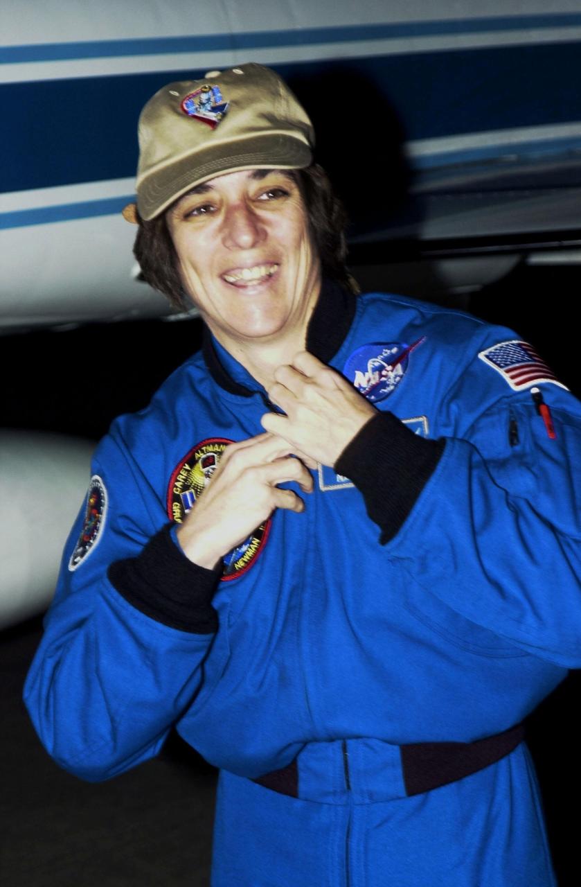 KENNEDY SPACE CENTER, Fla. - STS-109 Mission Specialist Nancy Currie arrives at KSC aboard a T-38 jet aircraft to begin launch preparations. This is Currie's fourth Shuttle flight. The goal of the 11-day mission is repair and maintenance on the Hubble Space Telescope. Five spacewalks are planned to replace Solar Array 2 with Solar Array 3, replace the Power Control Unit, remove the Faint Object Camera and install the Advanced Camera for Surveys (ACS), install the Near Infrared Camera and Multi-Object Spectrometer (NICMOS) Cooling System, and install New Outer Blanket Layer insulation. Launch is scheduled for Feb. 28 at 6:48 a.m. EST