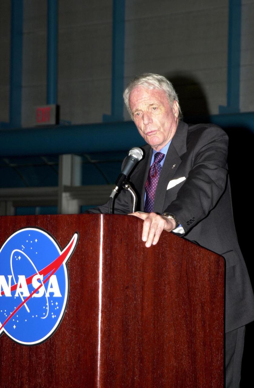 KENNEDY SPACE CENTER, FLA. -  Former astronaut Scott Carpenter shares his experiences with the audience in KSC's Apollo/Saturn V Center during the dinner celebration of the 40th anniversary of American spaceflight.  Carpenter became the second man to orbit the Earth aboard the spacecraft Aurora 7, May 24, 1962