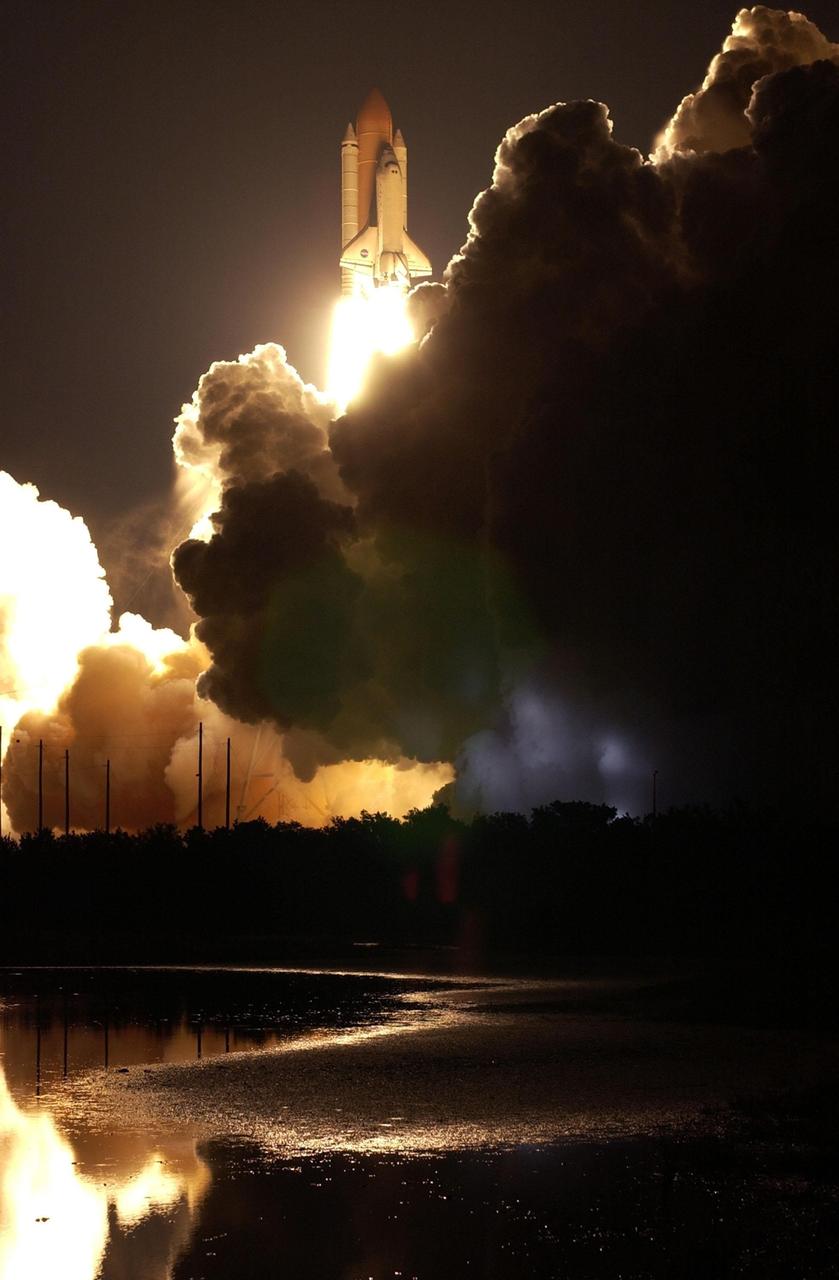 KENNEDY SPACE CENTER, Fla. -  Billowing clouds of smoke are backlit by the flames streaming from behind Space Shuttle Columbia as it leaps off the launch pad on its 27th flight into space on mission STS-109.  Liftoff occurred at 6:22:02:08 a.m. EST (11:22:02:08 GMT). The goal of the mission is the maintenance and upgrade of the Hubble Space Telescope, to be carried out in five spacewalks.  The crew of STS-109 comprises Commander Scott D. Altman, Pilot Duane G. Carey, Payload Commander John M. Grunsfeld, and Mission Specialists Nancy Jane Currie, Richard M. Linnehan, James H. Newman and Michael J. Massimino.  After an 11-day mission, Columbia is expected to return to Kennedy March 12 about 4:35 a.m. EST (09:35 GMT)