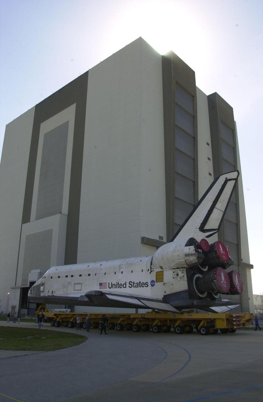 KENNEDY SPACE CENTER, Fla. -  After leaving the Orbiter Processing Facility, Orbiter Atlantis nears the Vehicle Assembly Building for space vehicle mate.  As part of final preparations before transfer to the launch pad, Atlantis will be lifted vertically into its VAB high bay and mated to the twin solid rocket boosters and external tank.  The STS-110 mission resumes International Space Station assembly operations with the delivery of the S0 truss, which will support solar panels providing additional power to the Station.  The payload will also include the first part of a Mobile Transporter that will provide a moveable base for the Station’s Canadian robotic arm.  STS-110 is scheduled for launch April 4