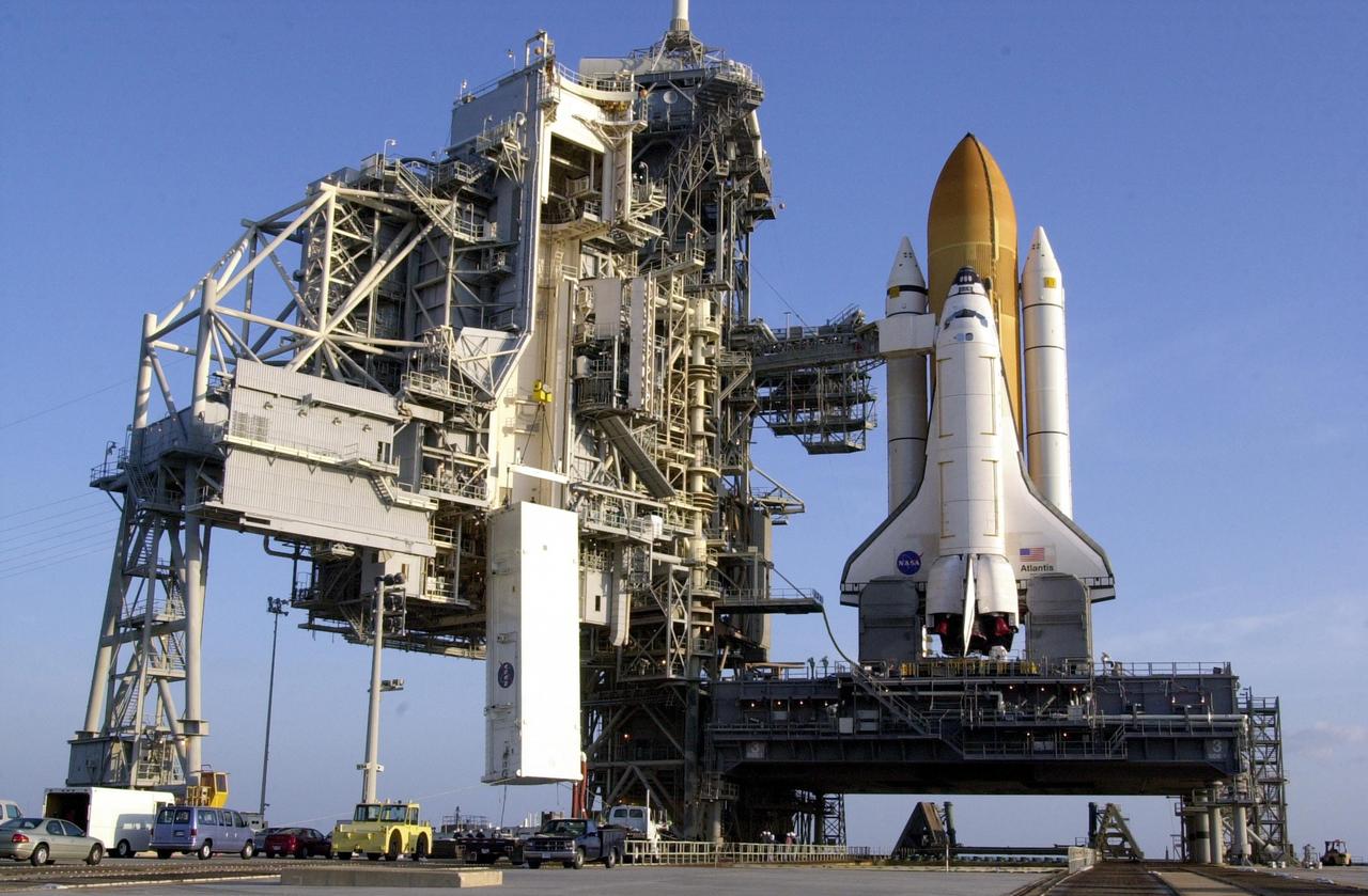 KENNEDY SPACE CENTER, FLA. --  On the launch pad, the payload canister with the S0 Integrated Truss Structure is lifted up the Rotating Service Structure to the payload changeout room for transfer to Space Shuttle Atlantis's payload bay. Part of the payload on mission STS-110, the S0 truss will become the backbone of the orbiting International Space Station (ISS).  The S0 truss will be attached to the U.S. Lab, "Destiny,"  on the 11-day mission.    Launch is scheduled for April 4