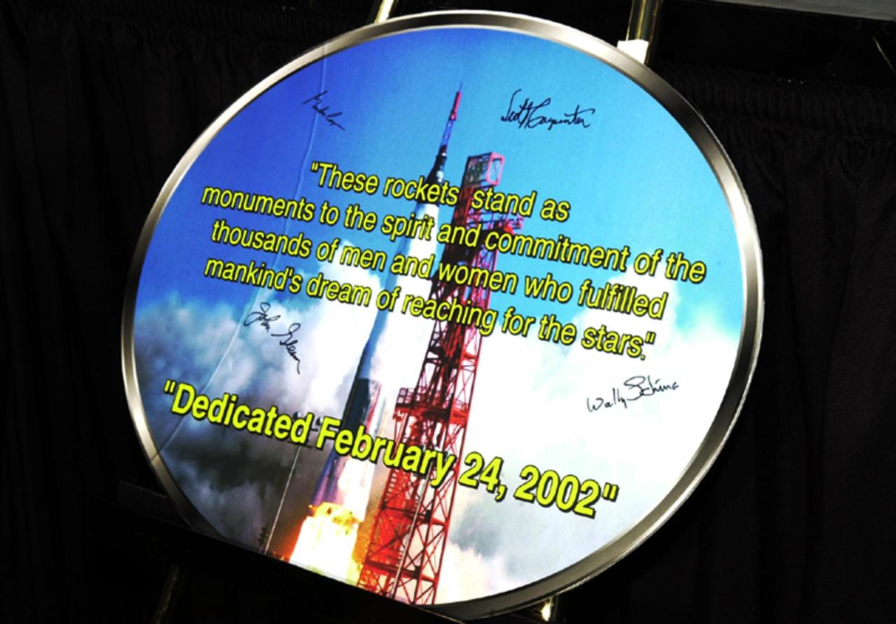 KENNEDY SPACE CENTER, FLA. -- This commemorative painting was presented during opening ceremonies for the 40th anniversary celebration of American spaceflight, It was signed by four of the space pioneers being honored: Wally Schirra, Gordon Cooper, John Glenn Jr. and Scott Carpenter. The ceremonies were held in the KSC Visitor Complex Rocket Garden. The event was capped with a dinner held at the KSC Apollo/Saturn V Center