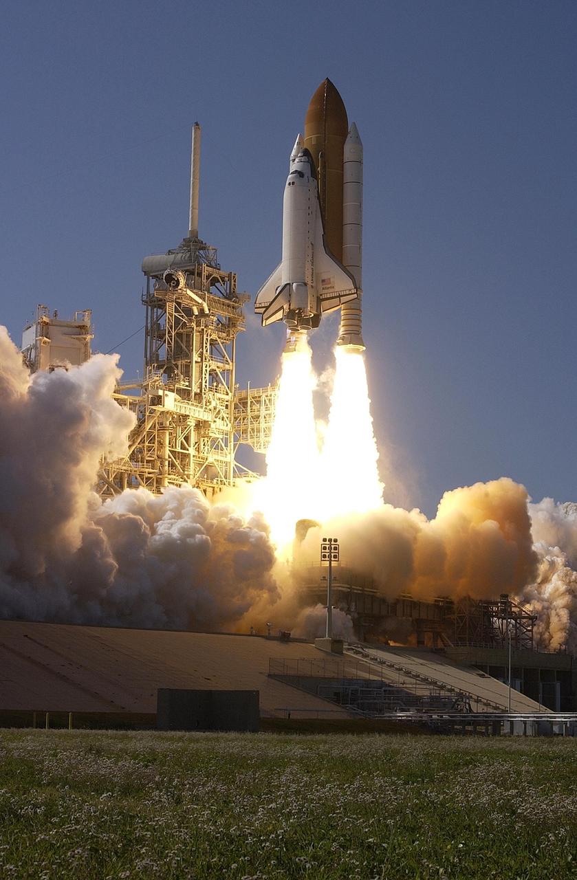 KENNEDY SPACE CENTER, FLA. -- Space Shuttle Atlantis hurtles into the clear blue sky as it lifts off on mission STS-110. Liftoff occurred at 4:44:19 p.m. EDT (20:44:19 GMT). STS-110 is the 13th assembly flight to the International Space Station