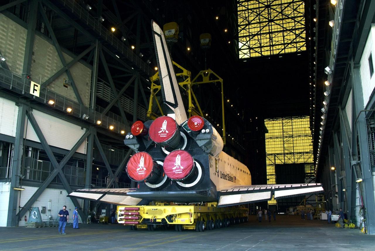 KENNEDY SPACE CENTER, FLA. -- Orbiter Endeavour sits in the transfer aisle of the Vehicle Assembly Building after rolling over from the Orbiter Processing Facility. After lifting, Endeavour will be mated to the External Tank/Solid Rocket Boosters atop the Mobile Launcher Platform. Endeavour is targeted to launch May 30, 2002, on mission STS-111 to the International Space Station. Mission goals include delivering and installing the Mobile Base System to complete the Canadian Mobile Service System and carrying the Expedition 5 crew to the Station for rotation with Expedition 4