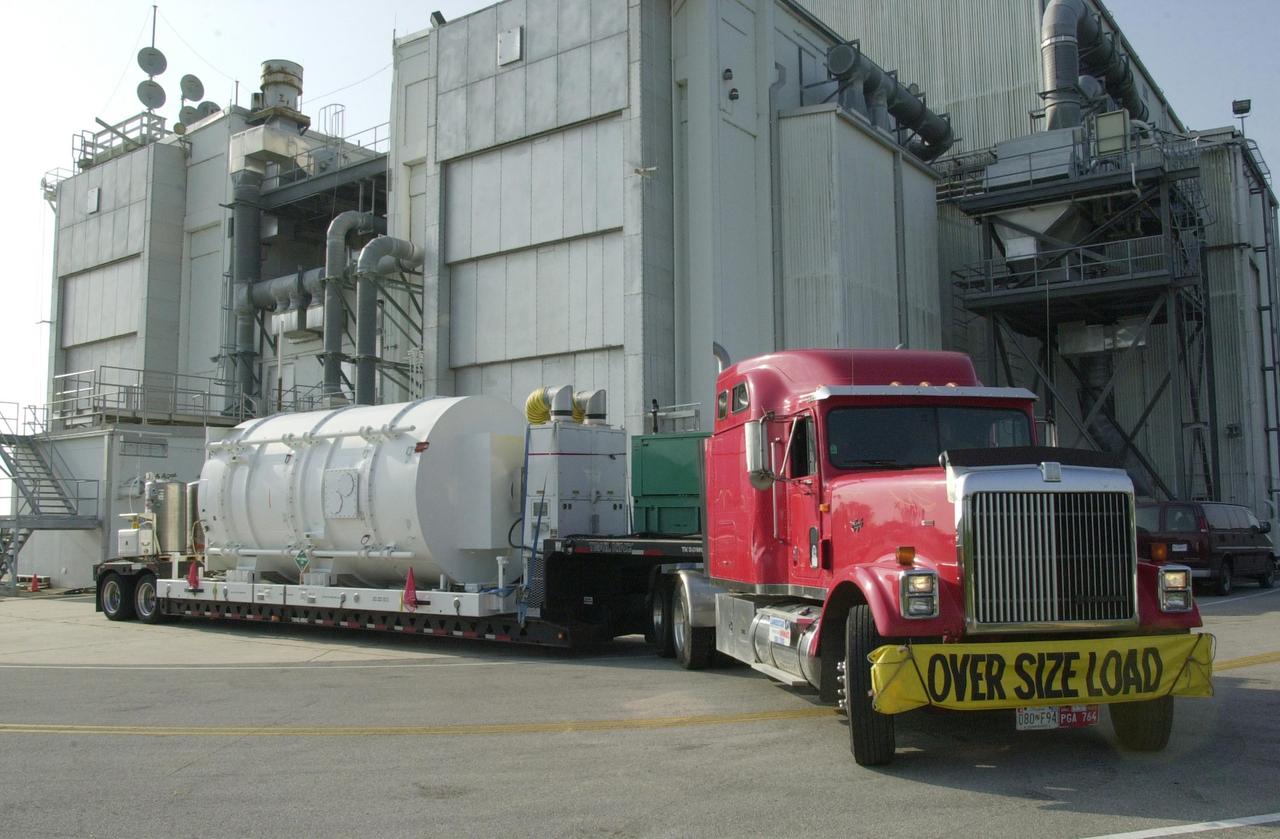 KENNEDY SPACE CENTER, FLA. -- The NASA Comet Nucleus Tour (CONTOUR) spacecraft arrived at KSC on April 24 and was transported to the Spacecraft Assembly and Encapsulation Facility-2 (SAEF-2) to begin final preparations for launch. CONTOUR will provide the first detailed look into the heart of a comet - the nucleus. The spacecraft will fly as close as 60 miles (100 kilometers) to at least two comets, Encke and Schwassmann-Wachmann 3, taking the sharpest pictures yet of the nucleus while analyzing the gas and dust that surround these rocky, icy building blocks of the solar system. The Applied Physics Laboratory of Johns Hopkins University, Baltimore, Md., built CONTOUR and will also be in control of the spacecraft after launch, scheduled for July 1, 2002, from LC 17A at Cape Canaveral Air Force Station