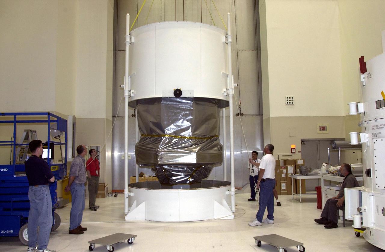 KENNEDY SPACE CENTER, FLA. -- The NASA Comet Nucleus Tour (CONTOUR) spacecraft arrived at KSC on April 24 and was transported to the Spacecraft Assembly and Encapsulation Facility-2 (SAEF-2) to begin final preparations for launch. CONTOUR will provide the first detailed look into the heart of a comet - the nucleus. The spacecraft will fly as close as 60 miles (100 kilometers) to at least two comets, Encke and Schwassmann-Wachmann 3, taking the sharpest pictures yet of the nucleus while analyzing the gas and dust that surround these rocky, icy building blocks of the solar system. The Applied Physics Laboratory of Johns Hopkins University, Baltimore, Md., built CONTOUR and will also be in control of the spacecraft after launch, scheduled for July 1, 2002, from LC 17A at Cape Canaveral Air Force Station