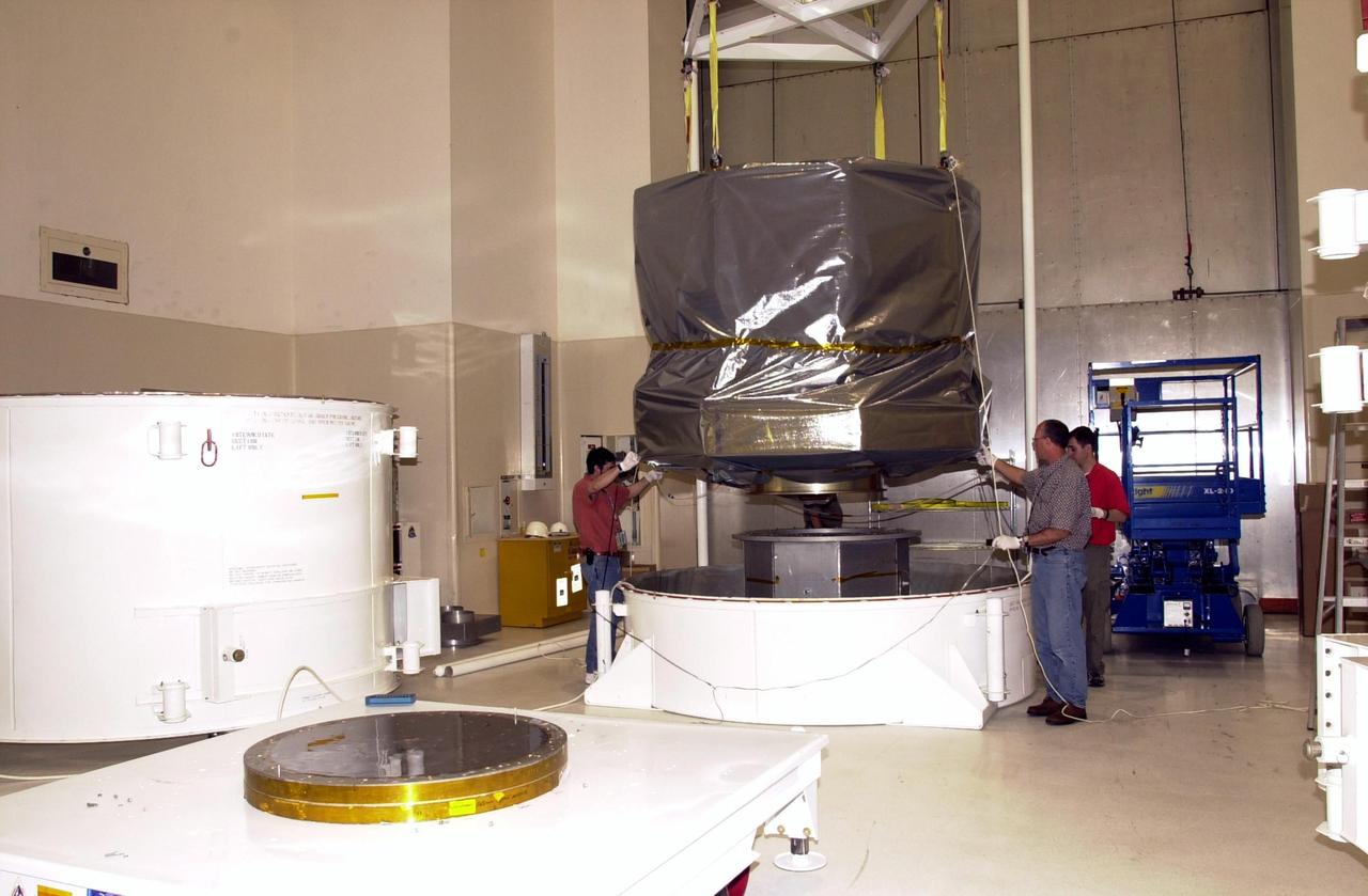 KENNEDY SPACE CENTER, FLA. -- The NASA Comet Nucleus Tour (CONTOUR) spacecraft arrived at KSC on April 24 and was transported to the Spacecraft Assembly and Encapsulation Facility-2 (SAEF-2) to begin final preparations for launch. CONTOUR will provide the first detailed look into the heart of a comet - the nucleus. The spacecraft will fly as close as 60 miles (100 kilometers) to at least two comets, Encke and Schwassmann-Wachmann 3, taking the sharpest pictures yet of the nucleus while analyzing the gas and dust that surround these rocky, icy building blocks of the solar system. The Applied Physics Laboratory of Johns Hopkins University, Baltimore, Md., built CONTOUR and will also be in control of the spacecraft after launch, scheduled for July 1, 2002, from LC 17A at Cape Canaveral Air Force Station