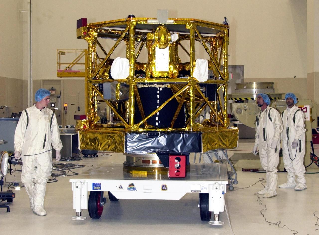 KENNEDY SPACE CENTER, FLA. -- The NASA Comet Nucleus Tour (CONTOUR) spacecraft arrived at KSC on April 24 and was transported to the Spacecraft Assembly and Encapsulation Facility-2 (SAEF-2) to begin final preparations for launch. CONTOUR will provide the first detailed look into the heart of a comet - the nucleus. The spacecraft will fly as close as 60 miles (100 kilometers) to at least two comets, Encke and Schwassmann-Wachmann 3, taking the sharpest pictures yet of the nucleus while analyzing the gas and dust that surround these rocky, icy building blocks of the solar system. The Applied Physics Laboratory of Johns Hopkins University, Baltimore, Md., built CONTOUR and will also be in control of the spacecraft after launch, scheduled for July 1, 2002, from LC 17A at Cape Canaveral Air Force Station