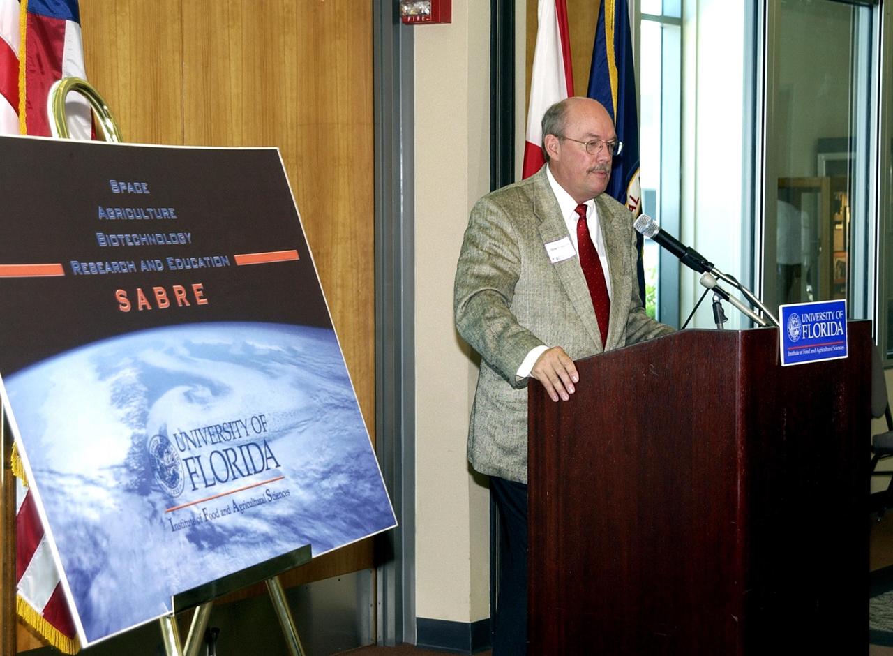 KENNEDY SPACE CENTER, FLA. -- Mike Martin, University of Florida vice president for agriculture and natural resources, speaks during the opening ceremony to launch a new program called SABRE, Space Agricultural Biotechnology Research and Education, that involves UF and NASA.  Officials from UF and NASA attended the event.  SABRE will focus on the discovery, development and application of the biological aspects of advanced life support strategies. The program will include faculty from UF's Institute of Food and Agricultural Sciences, who will be located at both KSC - in the state-owned Space Experiment Research and Processing Laboratory (SERPL) being built there - and UF in Gainesville.  SABRE will be directed by Robert Ferl, professor in the horticultural sciences department and assistant director of UF's Biotechnology Program.  He will be responsible for coordinating the research and education efforts of UF and NASA