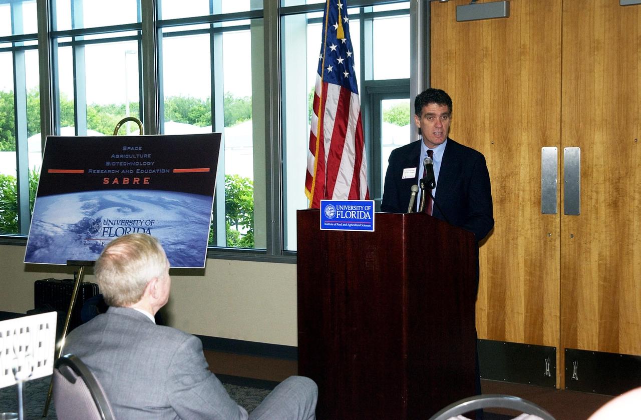 KENNEDY SPACE CENTER, FLA. --  U.S. Representative Dave Weldon addresses a large group attending the opening of a new program known as SABRE, Space Agricultural Biotechnology Research and Education, that involves the University of Florida and NASA. SABRE will focus on the discovery, development and application of the biological aspects of advanced life support strategies. The program will include faculty from UF's Institute of Food and Agricultural Sciences, who will be located at both KSC - in the state-owned Space Experiment Research and Processing Laboratory (SERPL) being built there - and UF in Gainesville. SABRE will be directed by Robert Ferl, professor in the horticultural sciences department and assistant director of UF's Biotechnology Program.  He will be responsible for coordinating the research and education efforts of UF and NASA