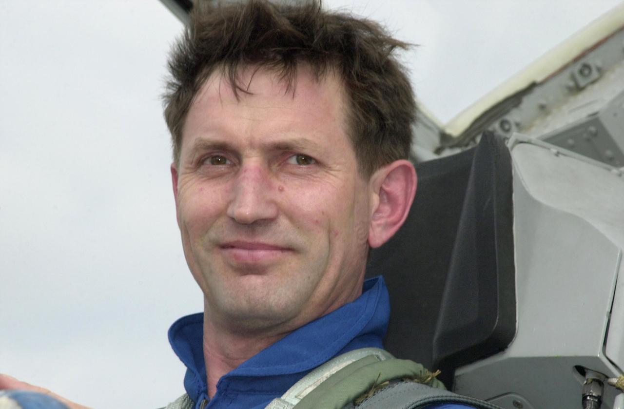 KENNEDY SPACE CENTER, FLA. - Expedition 5 crew member Sergei Y. Treschev, with the Russian Space Agency, arrives at KSC aboard a T-38 jet aircraft to take part in Terminal Countdown Demonstration Test (TCDT) activities, along with the Shuttle crew, for launch of mission STS-111.  Expedition 5 will travel on Space Shuttle Endeavour to the International Space Station as a replacement crew for Expedition 4.  The TCDT is a rehearsal for launch and includes emergency egress training, familiarization with payload and a simulated launch countdown.  Mission STS-111 is a utilization flight that will deliver equipment and supplies to the Station.  Along with the Multi-Purpose Logisitics Module Leonardo, the payload includes the Mobile Base System, part of the Canadian SSRMS and an Orbital Replacement Unit, the replacement wrist/roll joint for the SSRMS (Canadarm2).  Launch of Endeavour is scheduled for May 30, 2002