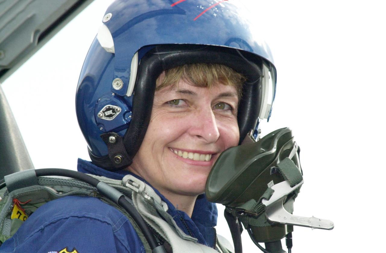 KENNEDY SPACE CENTER, FLA. -- Expedition 5 crew member Peggy Whitson arrives at KSC aboard a T-38 jet aircraft to take part in Terminal Countdown Demonstration Test (TCDT) activities, along with the Shuttle crew, for launch of mission STS-111.  Expedition 5 will travel on Space Shuttle Endeavour to the International Space Station as a replacement crew for Expedition 4.  The TCDT is a rehearsal for launch and includes emergency egress training, familiarization with payload and a simulated launch countdown.  Mission STS-111 is a utilization flight that will deliver equipment and supplies to the Station.  Along with the Multi-Purpose Logisitics Module Leonardo, the payload includes the Mobile Base System, part of the Canadian SSRMS and an Orbital Replacement Unit, the replacement wrist/roll joint for the SSRMS (Canadarm2).  Launch of Endeavour is scheduled for May 30, 2002