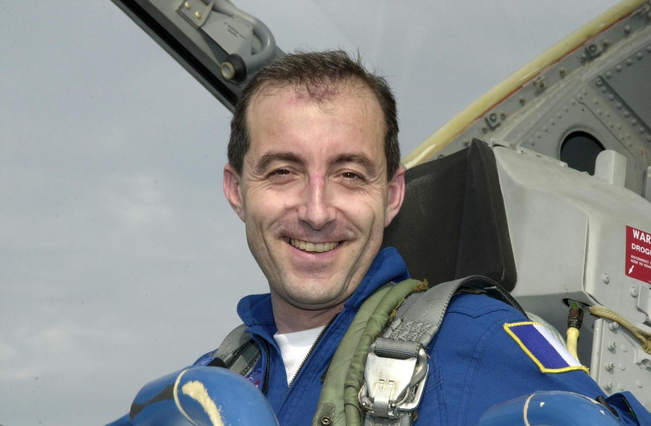 KENNEDY SPACE CENTER, FLA. -- STS-111 Mission Specialist Philippe Perrin,  with the French Space Agency, arrives at KSC aboard a T-38 jet aircraft to take part in Terminal Countdown Demonstration Test (TCDT) activities, along with the Expedition 5 crew, for launch of mission STS-111.  Expedition 5 will travel on Space Shuttle Endeavour to the International Space Station as a replacement crew for Expedition 4.  The TCDT is a rehearsal for launch and includes emergency egress training, familiarization with payload and a simulated launch countdown.  Mission STS-111 is a utilization flight that will deliver equipment and supplies to the Station.  Along with the Multi-Purpose Logisitics Module Leonardo, the payload includes the Mobile Base System, part of the Canadian Mobile Servicing System, or MSS, and an Orbital Replacement Unit, the replacement wrist/roll joint for the SSRMS (Canadarm2).  Launch of Endeavour is scheduled for May 30, 2002