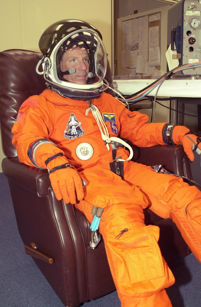 KENNEDY SPACE CENTER, FLA. - STS-111 Commander Kenneth Cockrell has suited up in preparation for a simulated launch countdown at the pad. The simulation is part of STS-111 Terminal Countdown Demonstration Test activities for the crew and Expedition 5. The payload on the mission to the International Space Station includes the Mobile Base System, an Orbital Replacement Unit and Multi-Purpose Logistics Module Leonardo.  The Expedition 5 crew is traveling on Endeavour to replace the Expedition 4 crew on the Station.  Launch of Endeavour is scheduled for May 30, 2002