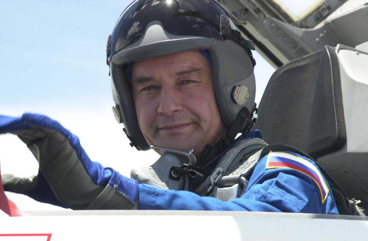 KENNEDY SPACE CENTER, FLA. -- Expedition 5 cosmonaut Valeri Korzun, who is commander on the crew, arrives at KSC aboard a T-38 jet aircraft to prepare for launch on mission STS-111. Korzun is  with the Russian Space Agency.  Expedition 5 will travel to the Station on Space Shuttle Endeavour as the replacement crew for Expedition 4, who will return to Earth aboard the orbiter.  Mission STS-111, known as Utilization Flight 2, is carrying supplies and equipment to the International Space Station. The payload includes the Multi-Purpose Logistics Module Leonardo, the Mobile Base System, which will be installed on the Mobile Transporter to complete the Canadian Mobile Servicing System, or MSS, and a replacement wrist/roll joint for Canadarm 2. The mechanical arm will then have the capability to "inchworm" from the U.S. Lab Destiny to the MSS and travel along the truss to work sites. Launch is scheduled for May 30, 2002