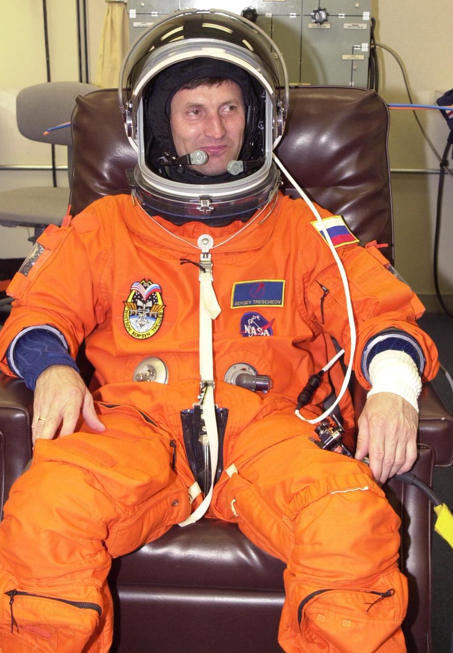 KENNEDY SPACE CENTER, FLA. -- Expedition 5 cosmonaut Sergei Treschev undergoes suit check as part of pre-launch activities. Treschev is with the Russian Space Agency.  Part of Mission STS-111, Expedition 5 will travel to the International Space Station on Space Shuttle Endeavour as the replacement crew for Expedition 4, who will return to Earth aboard the orbiter.  The mission, known as Utilization Flight 2, is carrying supplies and equipment to the Station. The payload includes the Multi-Purpose Logistics Module Leonardo, the Mobile Base System, which will be installed on the Mobile Transporter to complete the Canadian Mobile Servicing System, or MSS, and a replacement wrist/roll joint for Canadarm 2. The mechanical arm will then have the capability to "inchworm" from the U.S. Lab Destiny to the MSS and travel along the truss to work sites. Launch is scheduled for May 30, 2002