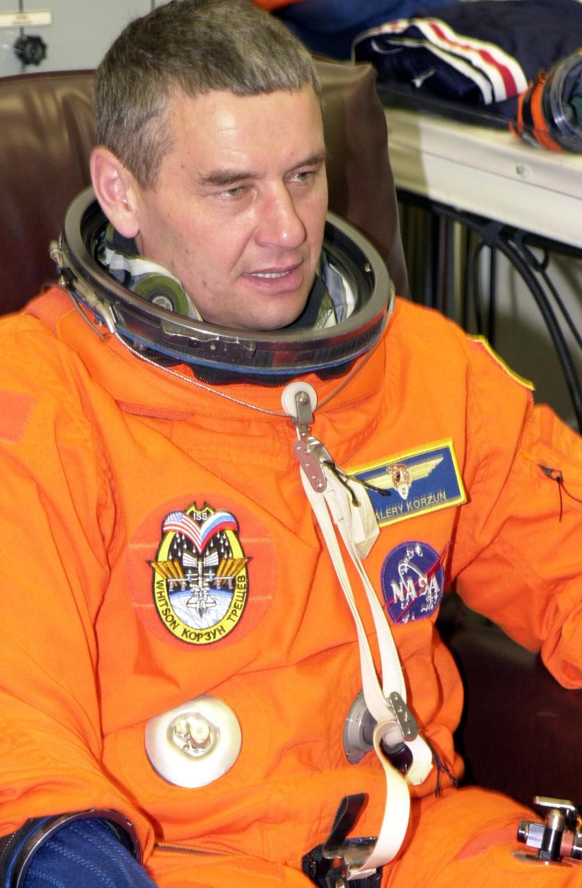 KENNEDY SPACE CENTER, FLA. -- Expedition 5 Commander Valeri Korzun undergoes suit check as part of pre-launch activities. Korzun is with the Russian Space Agency.  Part of Mission STS-111, Expedition 5 will travel to the International Space Station on Space Shuttle Endeavour as the replacement crew for Expedition 4, who will return to Earth aboard the orbiter.  The mission, known as Utilization Flight 2, is carrying supplies and equipment to the Station. The payload includes the Multi-Purpose Logistics Module Leonardo, the Mobile Base System, which will be installed on the Mobile Transporter to complete the Canadian Mobile Servicing System, or MSS, and a replacement wrist/roll joint for Canadarm 2. The mechanical arm will then have the capability to "inchworm" from the U.S. Lab Destiny to the MSS and travel along the truss to work sites. Launch is scheduled for May 30, 2002