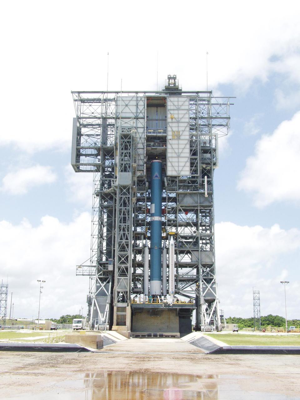 KENNEDY SPACE CENTER, FLA. -- On Launch Pad 17-A, Cape Canaveral Air Force Station, the solid rocket boosters have been installed on the first stage of a Boeing Delta II rocket. The rocket will be the launch vehicle for the CONTOUR spacecraft, scheduled to launch July 1. CONTOUR will provide the first detailed look into the heart of a comet -- the nucleus. The spacecraft will fly close to at least two comets, Encke and Schwassmann-Wachmann 3, taking pictures of the nucleus while analyzing the gas and dust that surround these rocky, icy building blocks of the solar system.