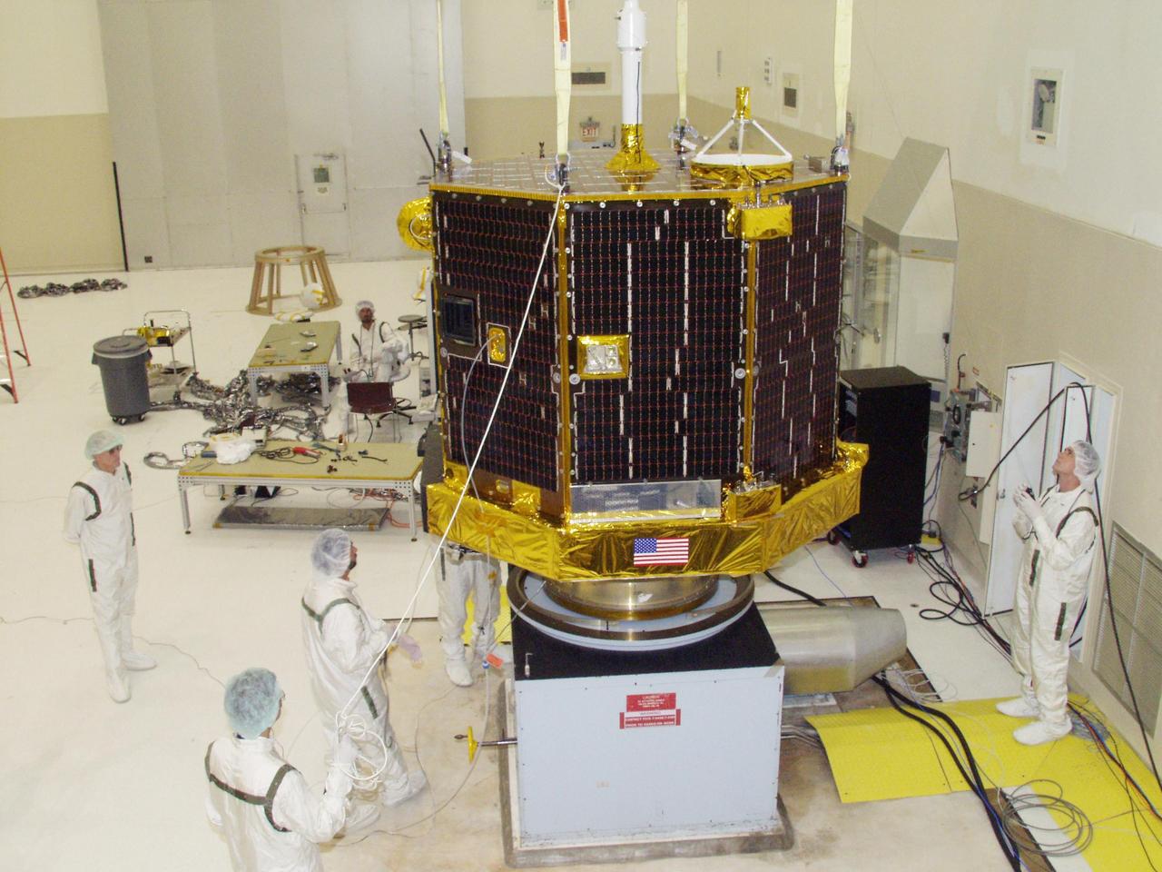 KENNEDY SPACE CENTER, FLA. -- The Comet Nucleus Tour (CONTOUR) spacecraft settles on the spin table in the Spacecraft Assembly and Encapsulation Facility 2 for its spin test. CONTOUR will provide the first detailed look into the heart of a comet -- the nucleus. Flying as close as 60 miles (100 kilometers) to at least two comets, the spacecraft will take the sharpest pictures yet of a nucleus while analyzing the gas and dust that surround these rocky, icy building blocks of the solar system.  Launch of CONTOUR aboard a Boeing Delta II rocket is scheduled for July 1 from Launch Pad 17-A, Cape Canaveral Air Force Station