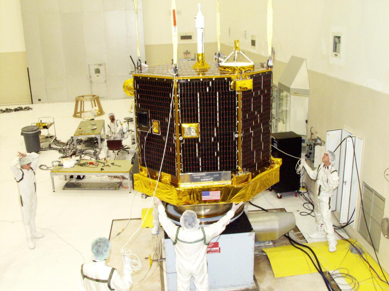 KENNEDY SPACE CENTER, FLA. -- The Comet Nucleus Tour (CONTOUR) spacecraft is ready for its spin test in the Spacecraft Assembly and Encapsulation Facility 2. CONTOUR will provide the first detailed look into the heart of a comet -- the nucleus. Flying as close as 60 miles (100 kilometers) to at least two comets, the spacecraft will take the sharpest pictures yet of a nucleus while analyzing the gas and dust that surround these rocky, icy building blocks of the solar system.  Launch of CONTOUR aboard a Boeing Delta II rocket is scheduled for July 1 from Launch Pad 17-A, Cape Canaveral Air Force Station