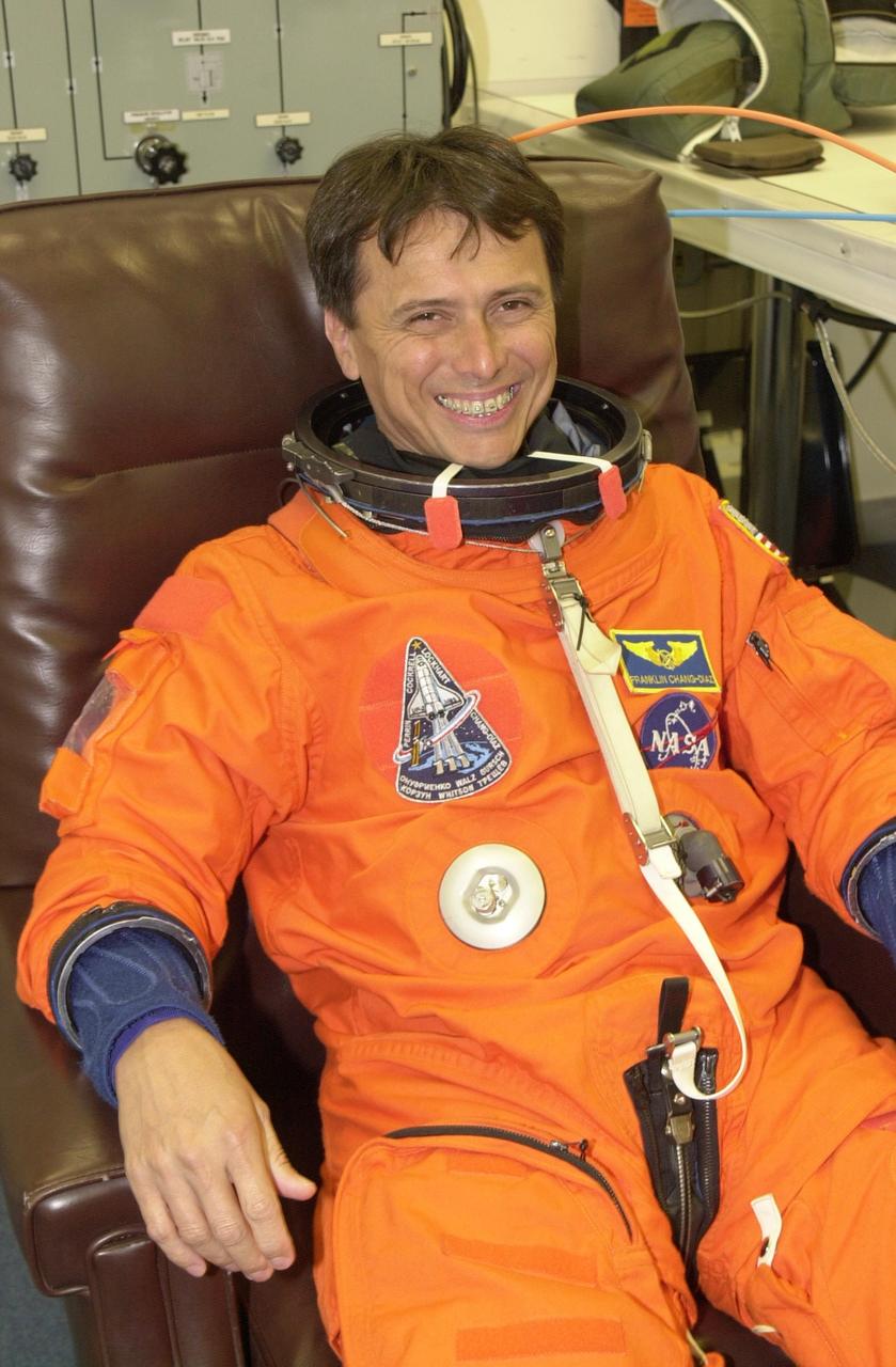 KENNEDY SPACE CENTER, FLA. -- STS-111 Mission Specialist Franklin Chang-Diaz suits up for launch, scheduled at 7:44 p.m. EDT, May 30, 2002. This is his seventh Shuttle flight, only the second astronaut to achieve that number. STS-111 is the second Utilization Flight to the International Space Station, carrying the Multi-Purpose Logistics Module Leonardo, the Mobile Base System (MBS), and a replacement wrist/roll joint for the Canadarm 2. Also onboard Space Shuttle Endeavour is the Expedition 5 crew who will replace Expedition 4 on board the Station. The MBS will be installed on the Mobile Transporter to complete the Canadian Mobile Servicing System, or MSS. The mechanical arm will then have the capability to "inchworm" from the U.S. Lab Destiny to the MSS and travel along the truss to work sites. Expedition 4 crew members will return to Earth with the STS-111 crew on Endeavour