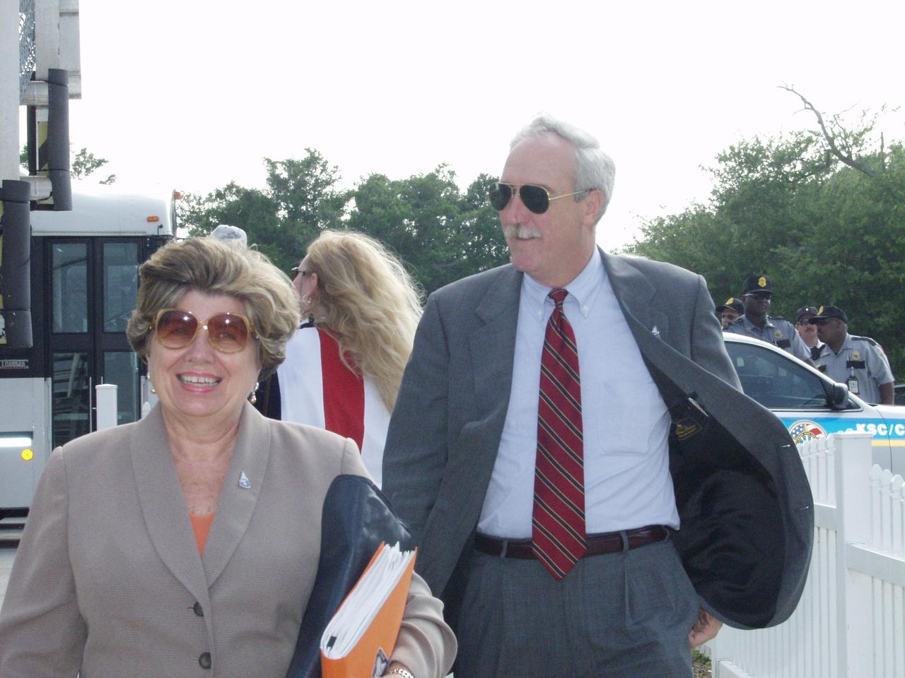 KENNEDY SPACE CENTER, FLA. - External Relations and Business Development Director JoAnn Morgan (left) and NASA Administrator Sean O'Keefe (right) arrive at the KSC viewing site to watch the launch of Space Shuttle Endeavour on mission STS-111 to the International Space Station. Liftoff occurred on time at 5:22:49 p.m EDT.  This mission marks the 14th Shuttle flight to the International Space Station and the third Shuttle mission this year. Mission STS-111 is the 18th flight of Endeavour and the 110th flight overall in NASA's Space Shuttle program