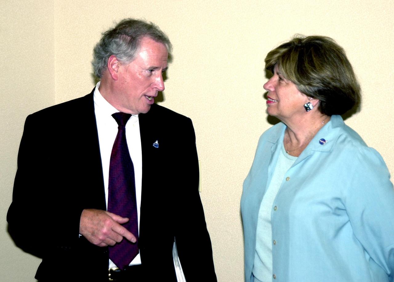 KENNEDY SPACE CENTER, FLA. -- NASA Associate Deputy Administrator Dr. Daniel Mulville speaks with KSC External Relations and Business Development Director JoAnn Morgan during the 2002 Florida Press Association and Florida Society of Newspaper Editors Convention held at the Debus Center, KSC Visitors Complex. Serving as keynote speaker for the event was NASA Associate Deputy Administrator Dr. Daniel Mulville.   Center Director Roy D. Bridges Jr. also addressed attendees and kicked off a tour of the Center