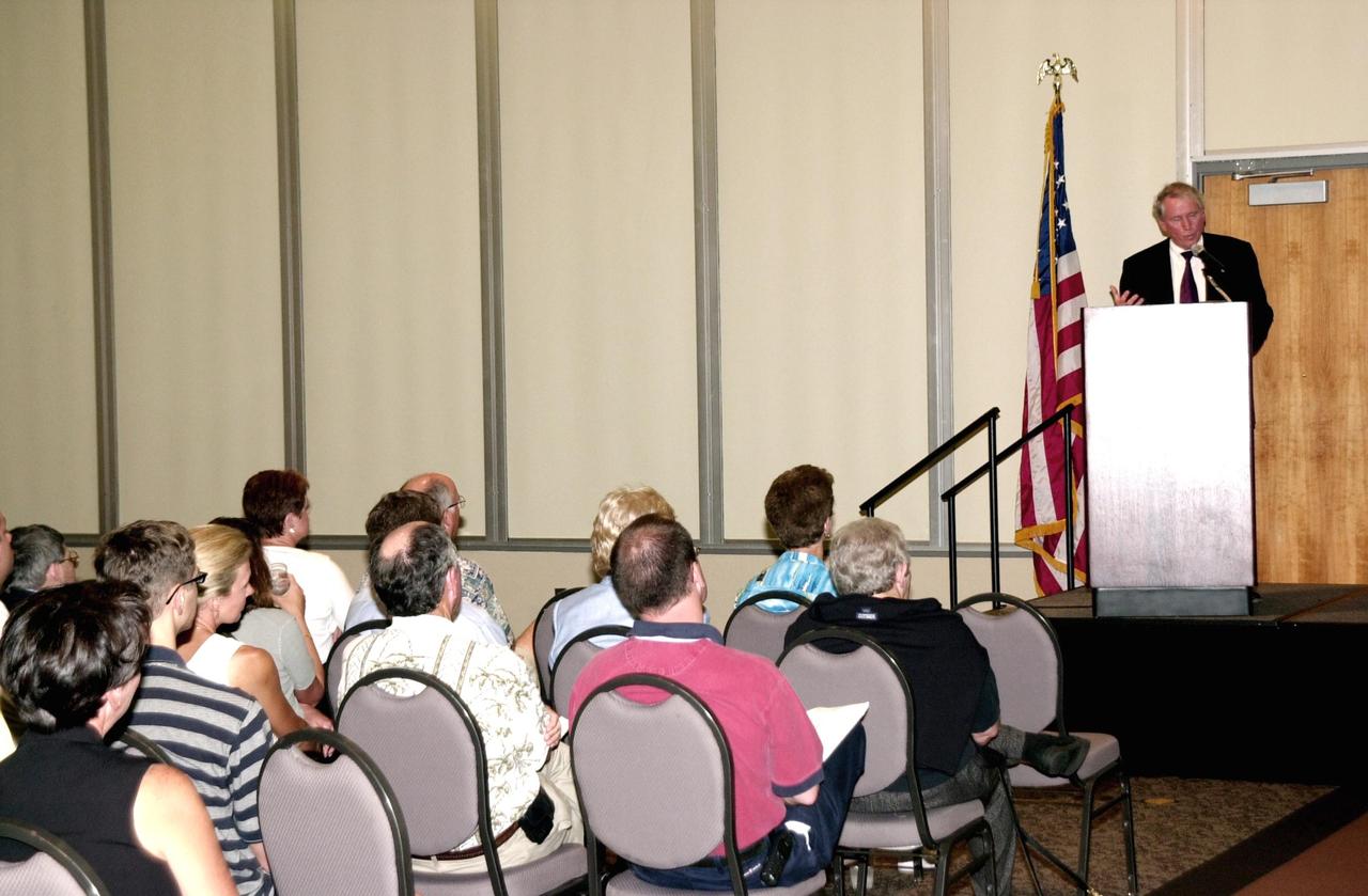 KENNEDY SPACE CENTER, FLA. -- NASA Associate Deputy Administrator Dr. Daniel Mulville addresses attendees of the 2002 Florida Press Association and Florida Society of Newspaper Editors Convention held at the Debus Center, KSC Visitors Complex.  Mulville was the keynote speaker. Center Director Roy D. Bridges Jr. also addressed attendees and kicked off a tour of the Center