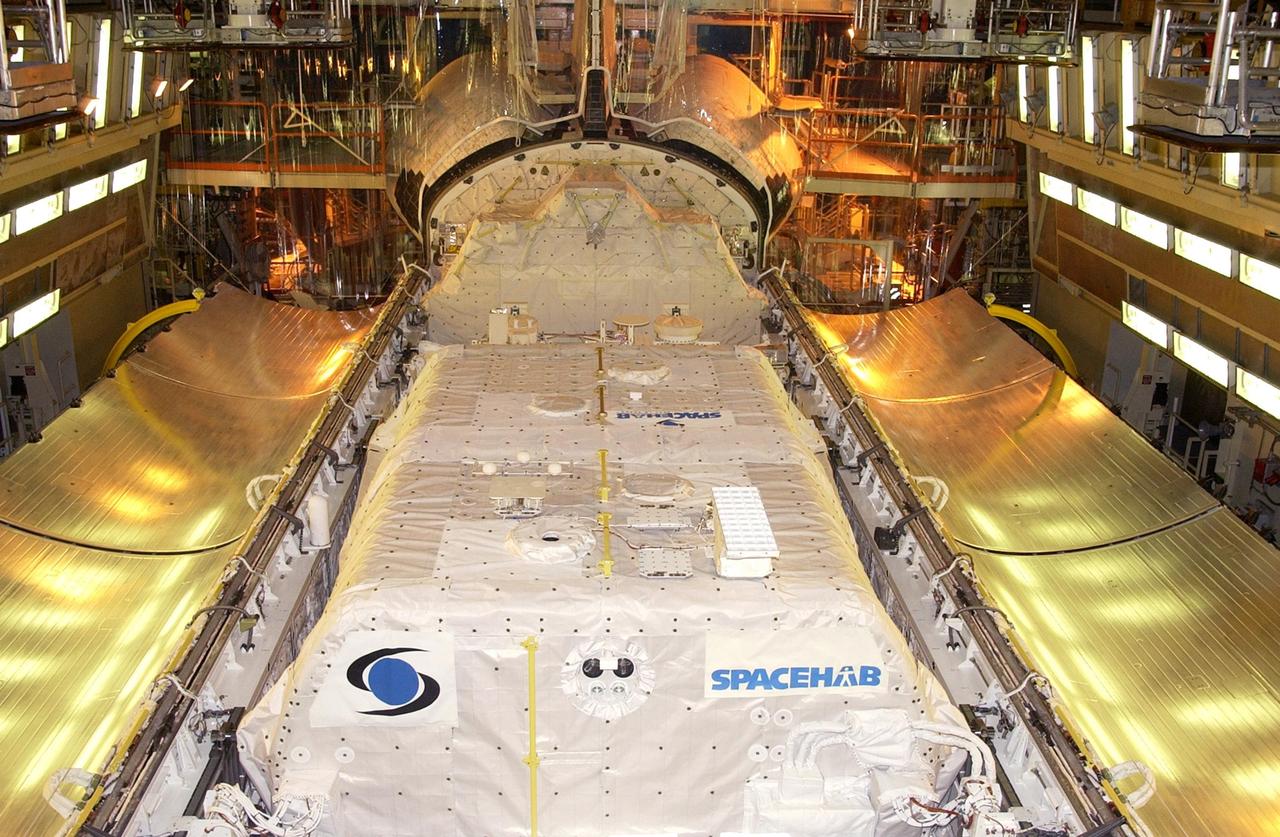 KENNEDY SPACE CENTER, FLA. --  With its SHI Research Double Module (SHI/RDM) and other cargo installed, Columbia's payload bay doors are ready to be closed for mission STS-107.  A research mission, STS-107 is scheduled for launch July 19, 2001