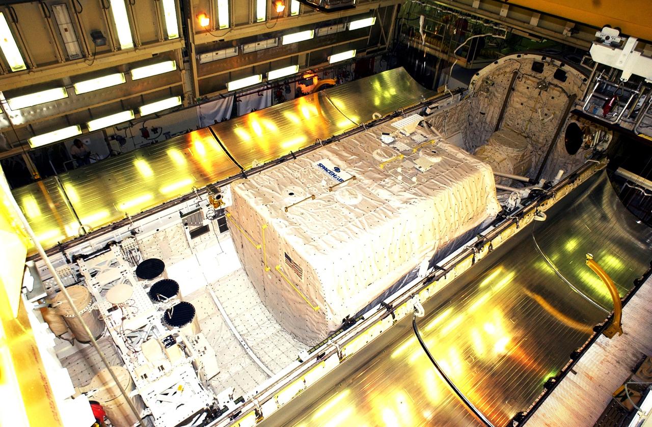 KENNEDY SPACE CENTER, FLA. - -- Columbia's payload bay doors are ready to be closed for mission STS-107. Installed inside are the Hitchhiker Bridge, a carrier for the Fast Reaction Experiments Enabling Science, Technology, Applications and Research (FREESTAR) that incorporates eight high priority secondary attached shuttle experiments, plus the SHI Research Double Module (SHI/RDM), also known as SPACEHAB. STS-107 is scheduled for launch July 19, 2001