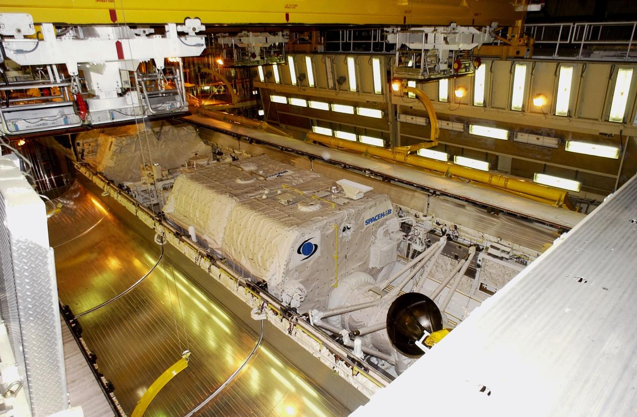 KENNEDY SPACE CENTER, FLA. -- Columbia's payload bay doors are ready to be closed for mission STS-107. Installed inside are the Hitchhiker Bridge, a carrier for the Fast Reaction Experiments Enabling Science, Technology, Applications and Research (FREESTAR) that incorporates eight high priority secondary attached shuttle experiments, plus the SHI Research Double Module (SHI/RDM), also known as SPACEHAB. STS-107 is scheduled for launch July 19, 2001